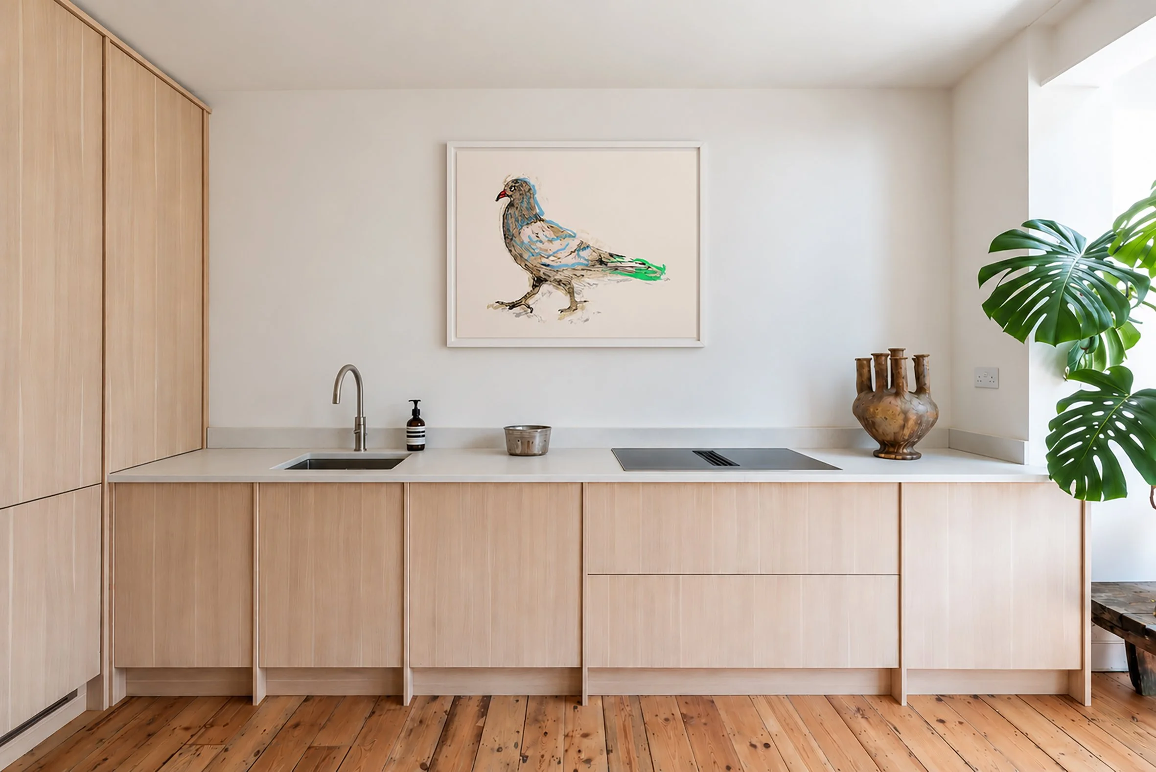 pigeon large on frame on wall.jpg