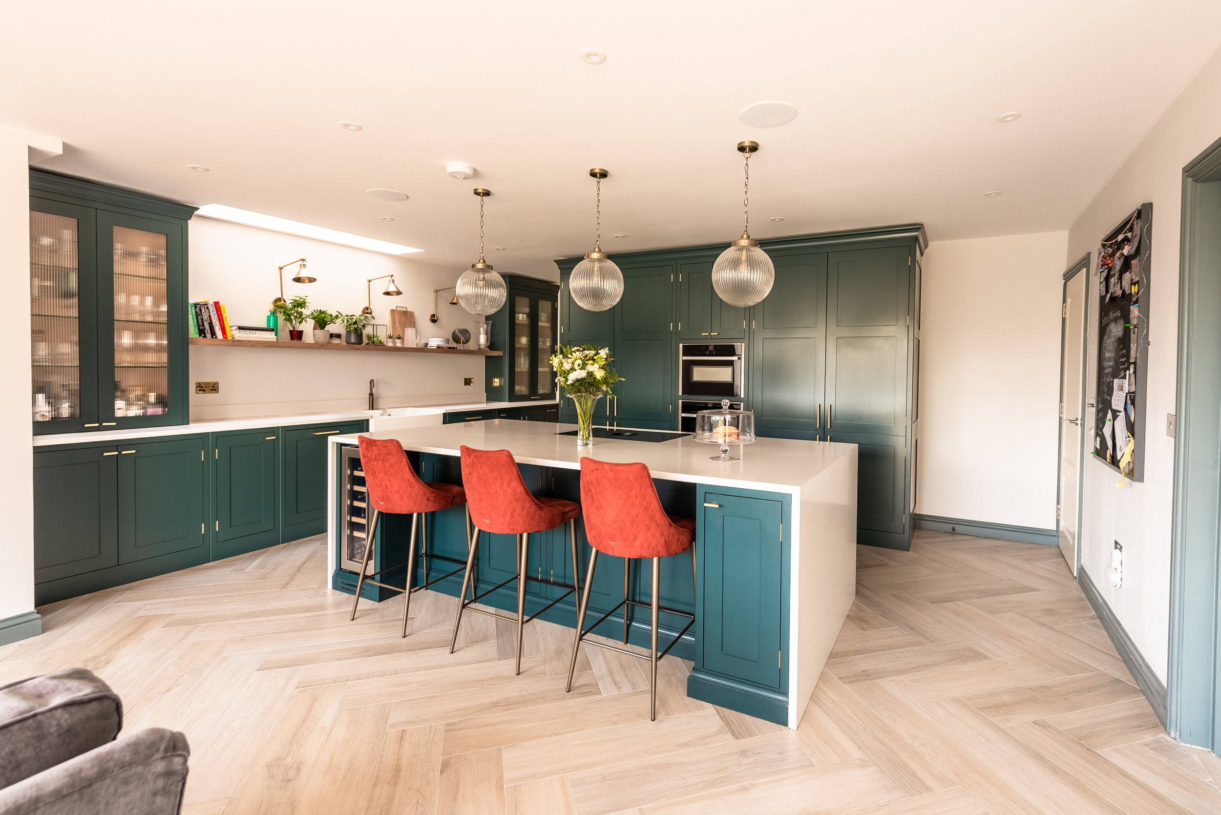 Large open plan green kitchen in east molesey by herringbone kitchens
