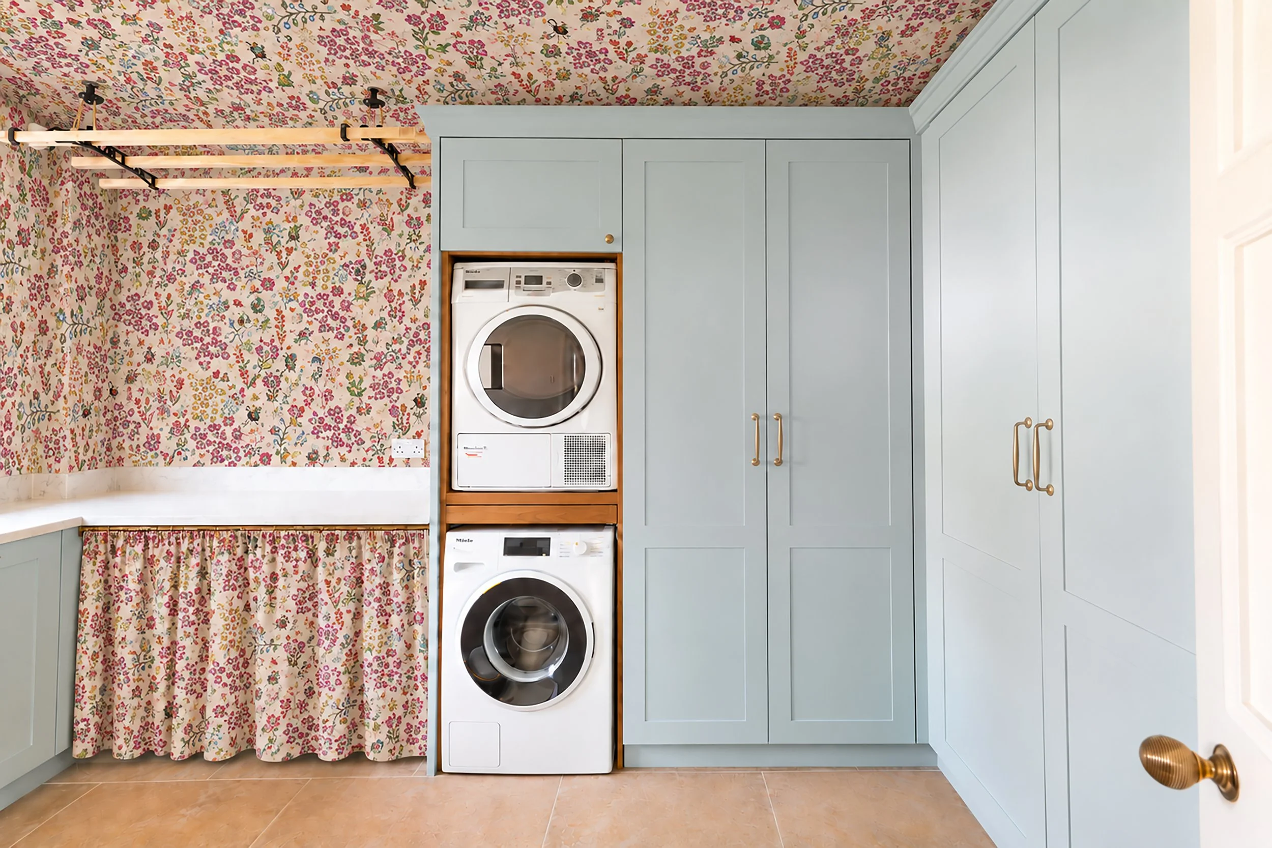 woodland creatures wallpaper in lauundry room.jpg