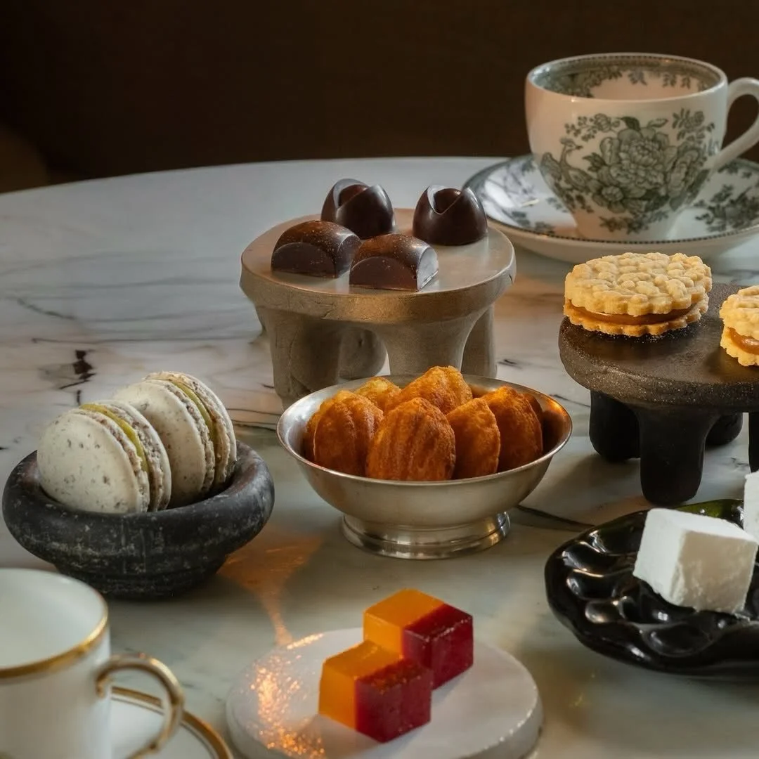 Some of our small plates working together at @hermetikken.restaurant ⭐️ here in Stavanger; the small soap stone bowl ROCKY XS, an early prototype edition of the ceramic pedestal plate LOFT MILD, our recycled glass plate RUGLE in the green wine bottle