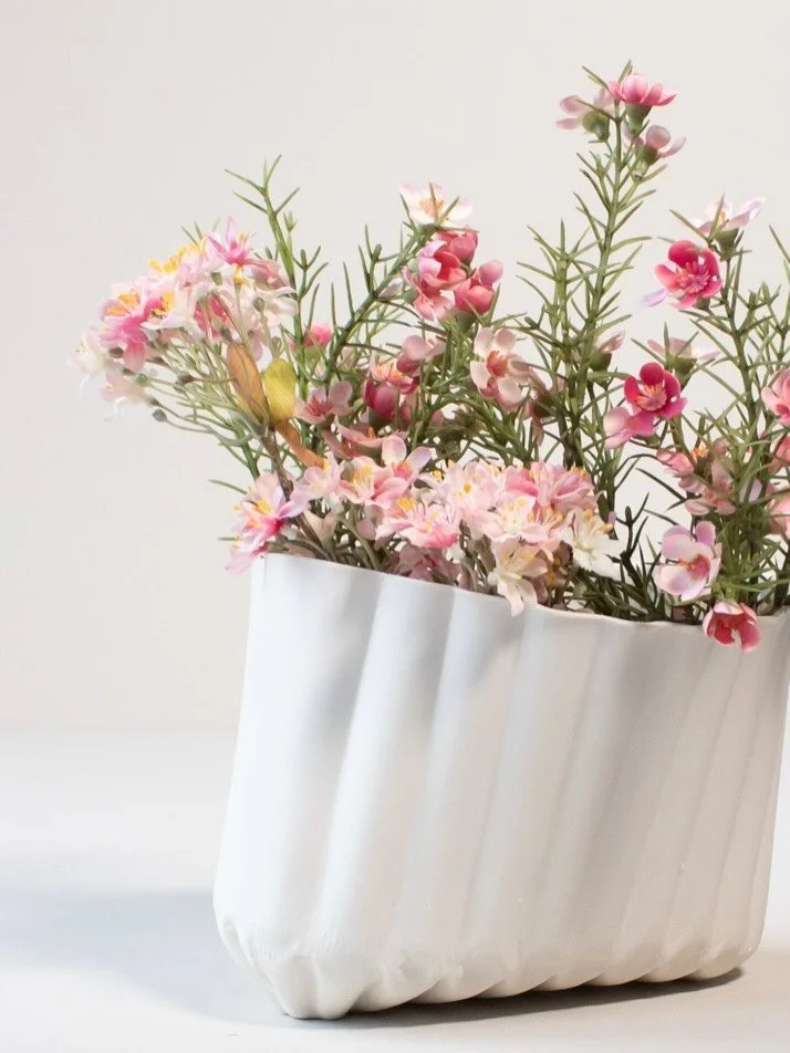 Say hi to DUVE, a very characteristic vase with a soft feeling. It hints to soft textiles flowing in the breeze or to the softness of down-filled fabrics. Each DUVE is naturally deformed in the glaze firing, making the shape slightly different from t