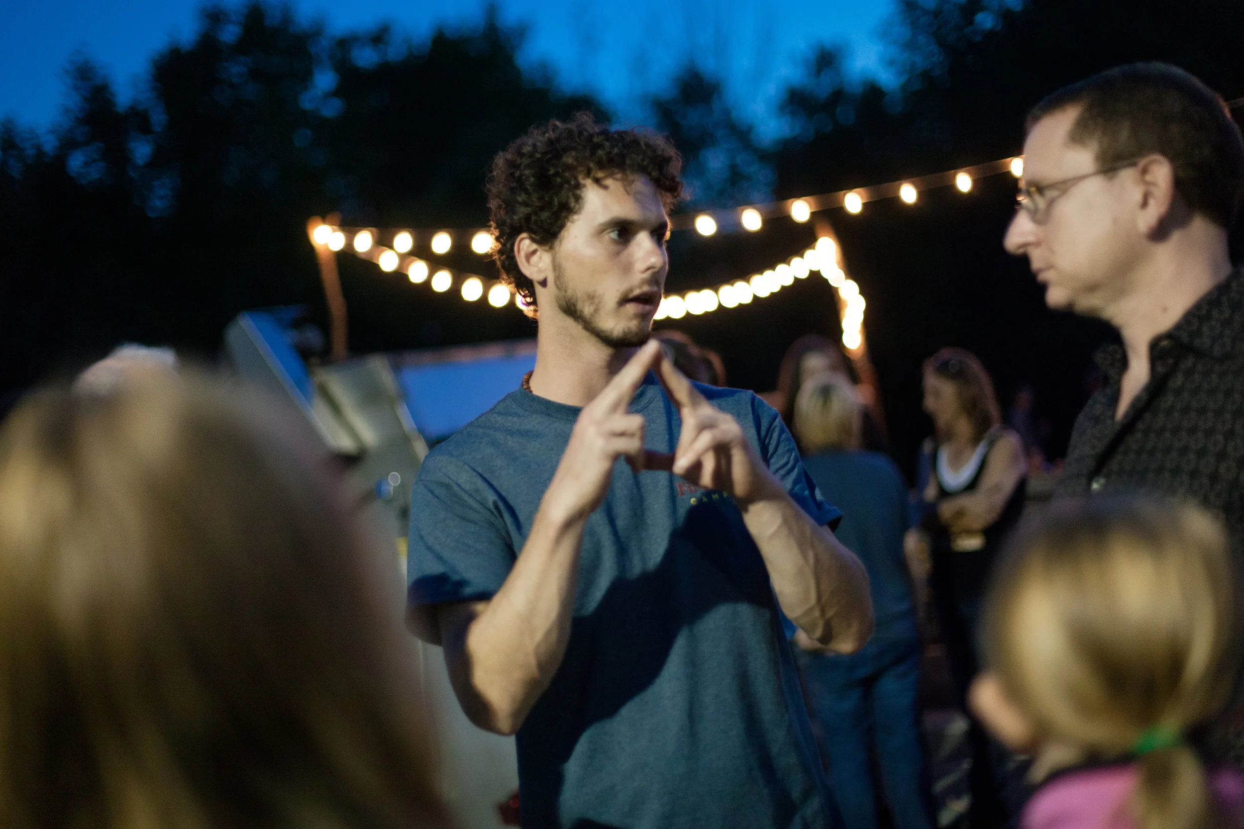 Bobby describing Firelight Camps to a group of guests. It's visually easy to describe the "tent" business!