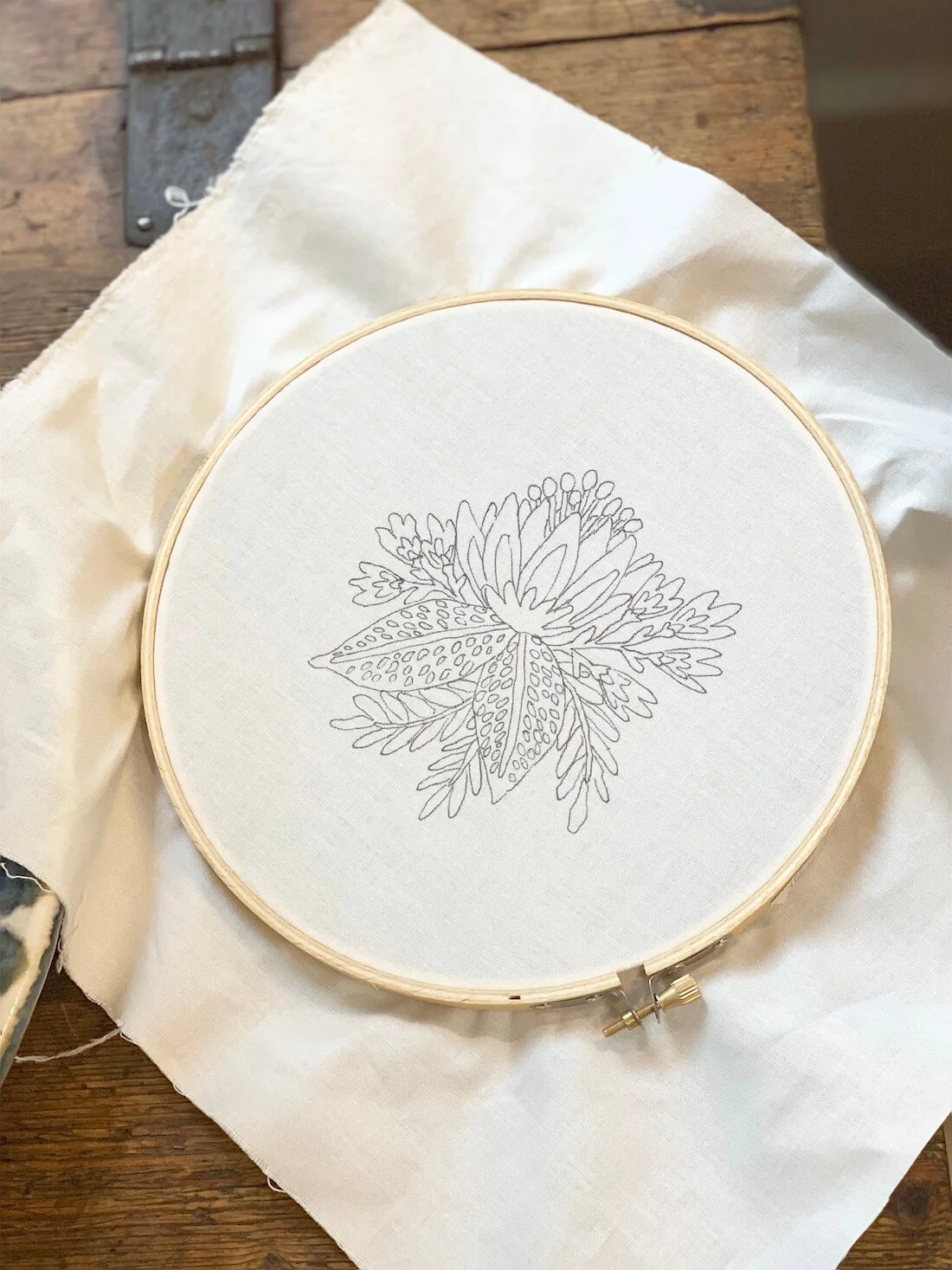 I trace designs with a fine point Sharpie Pen and just make sure to cover all of the pen markings with floss. I find it ten times easier than working with transfer papers or chalks or transfer pens.