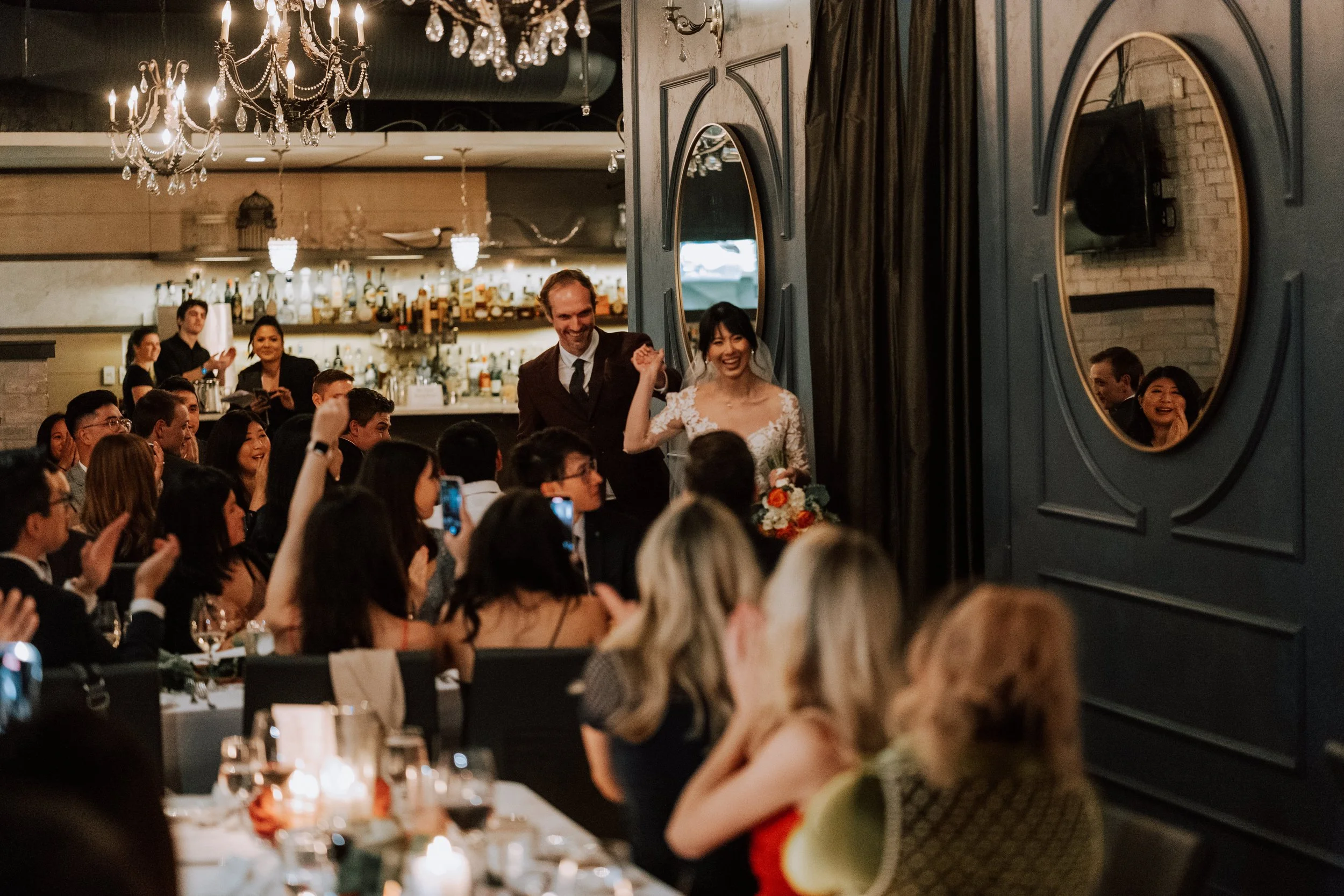 Bride and groom making their grand entrance during the wedding reception at Brix & Mortar in Yaletown, Vancouver.
