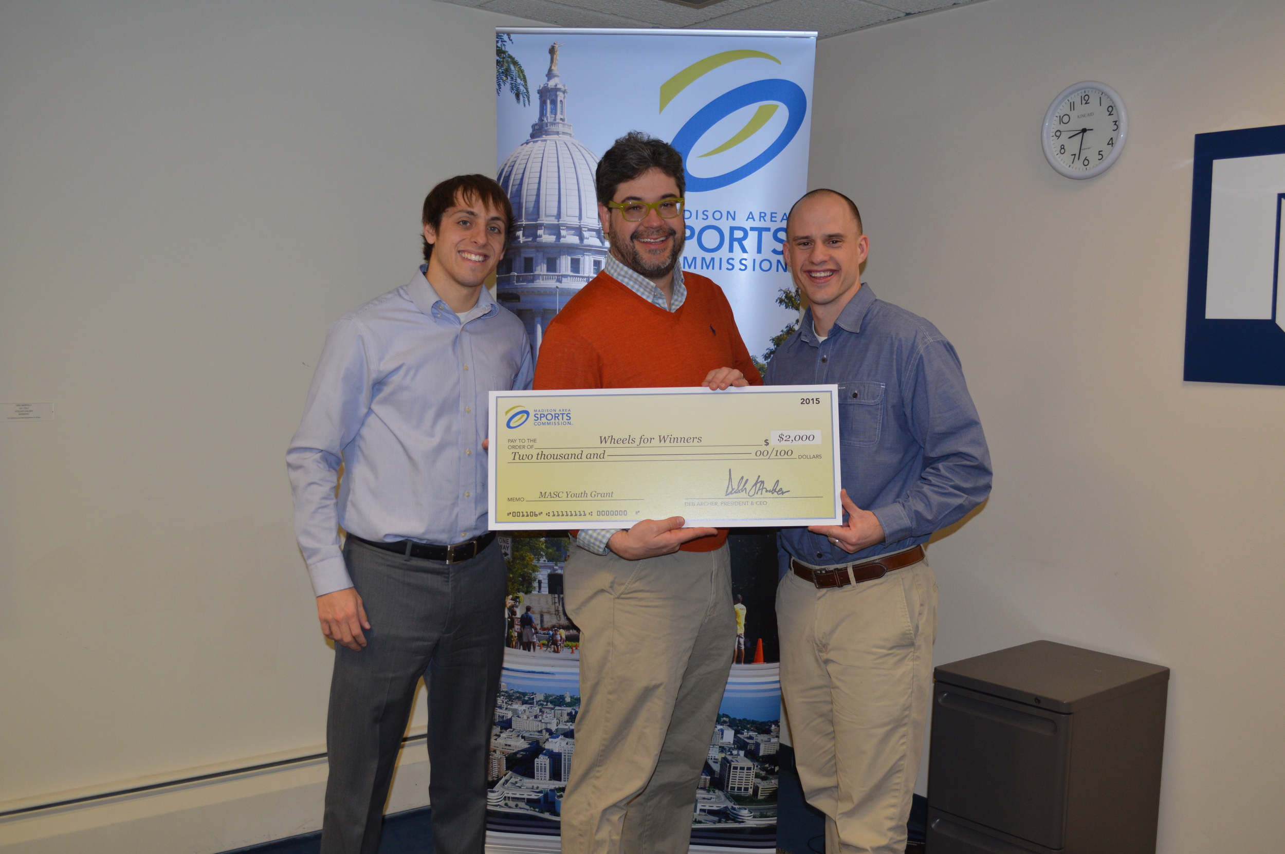 A big thanks to the Madison Area Sport Commission for choosing Wheels for Winners as one of the recipients of this year's youth grant. Pictured from left to right: Brandon Holstein (MASC Account Manager), Stephen Bagwell (Wheels for Winners President), and Jamie Patrick (MASC Vice President).