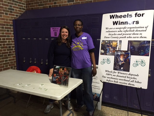 Madison School and Community Recreation (MSCR) held a free Family Festival & Resource Fair on April 24th at East High School. Attendees enjoyed activities based on the evening’s theme “Be the Best You.” Pictured above are Katy Coelho, Wheels for Winners board member and Ericka Brown, MSCR After School Director of Hawthorne Elementary.