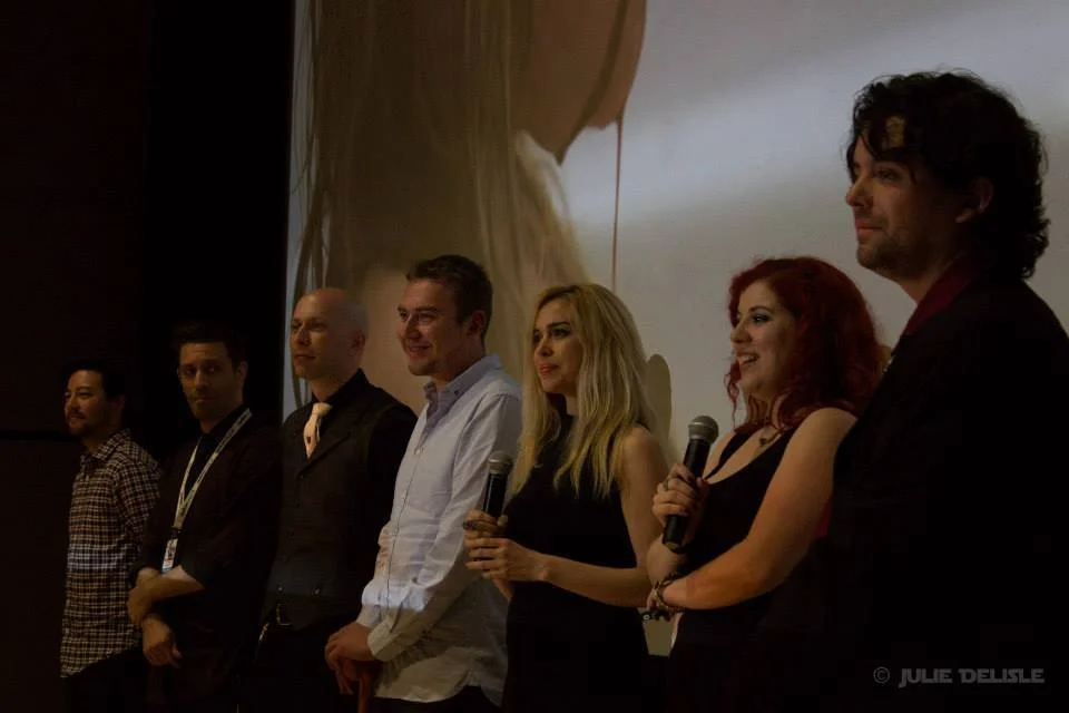 Shannon Lark on stage with the cast, crew, and director, Maude Michaud, of DYS- for the world premiere at Fantasia International Film Festival. Photo by Julie Delisle. Shot in Montreal, Quebec.