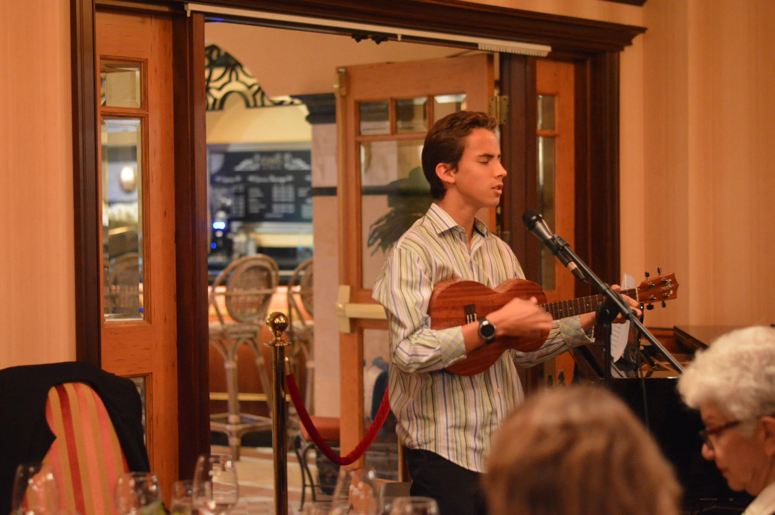 Joel Gomez performing his single “Running Blind” for the guests at Covo
