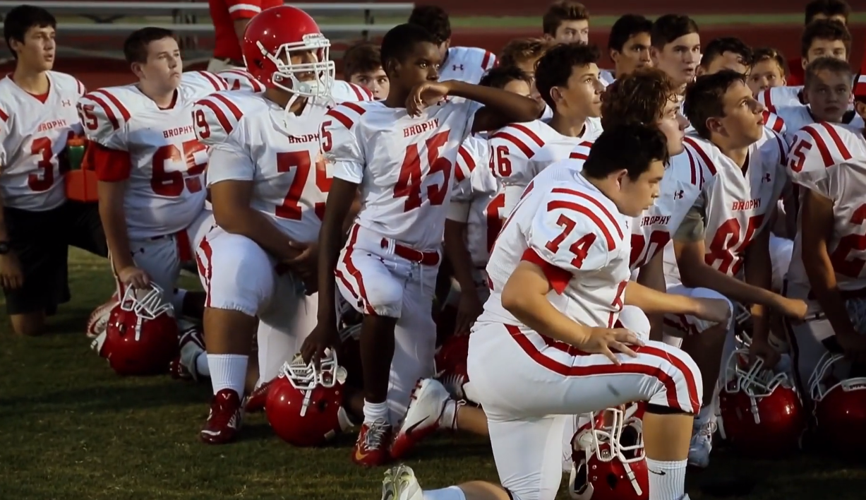 Adonis (#45) with his team