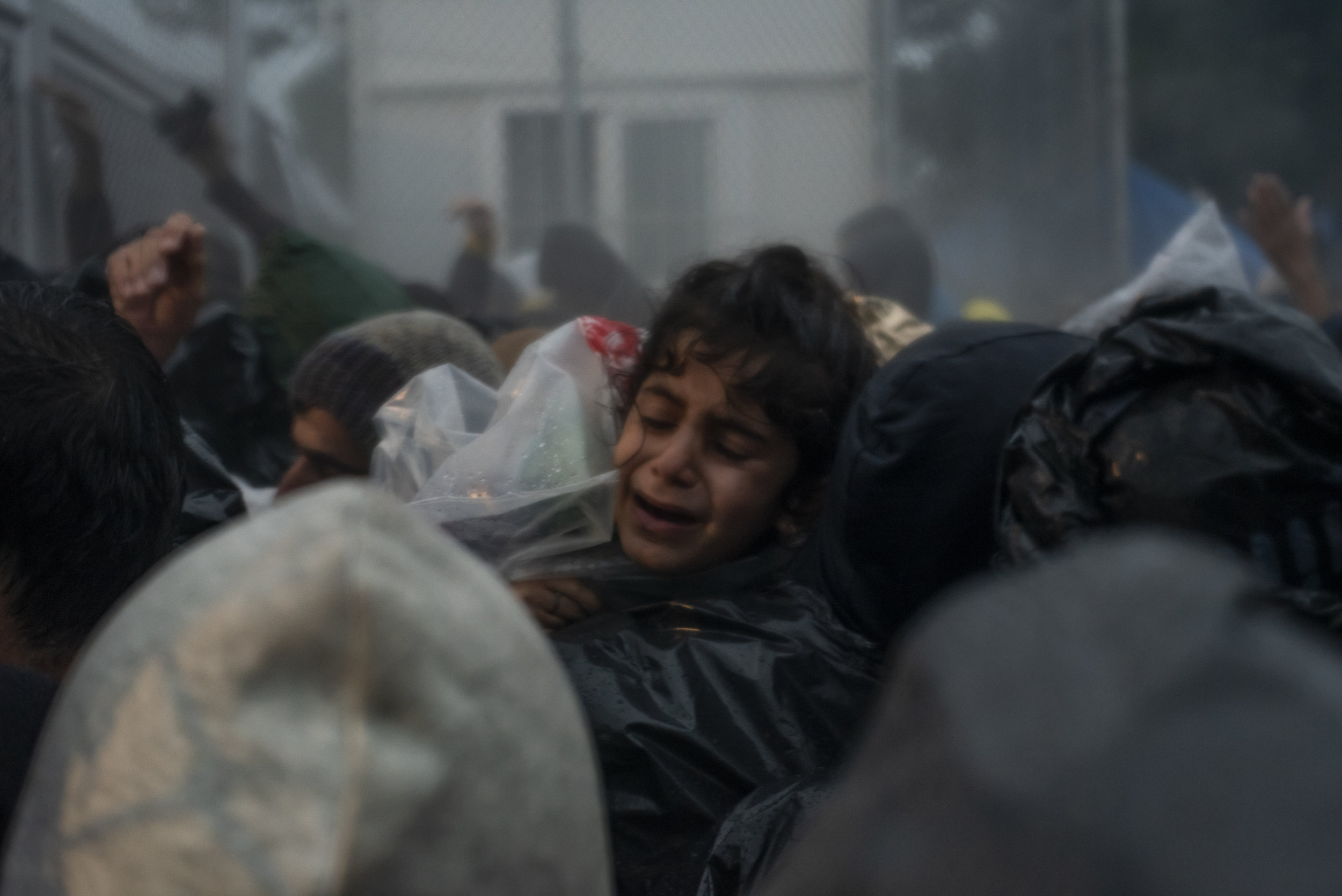  As conditions become unbearable people attempt to storm the gates of the Moria refugee camp. 