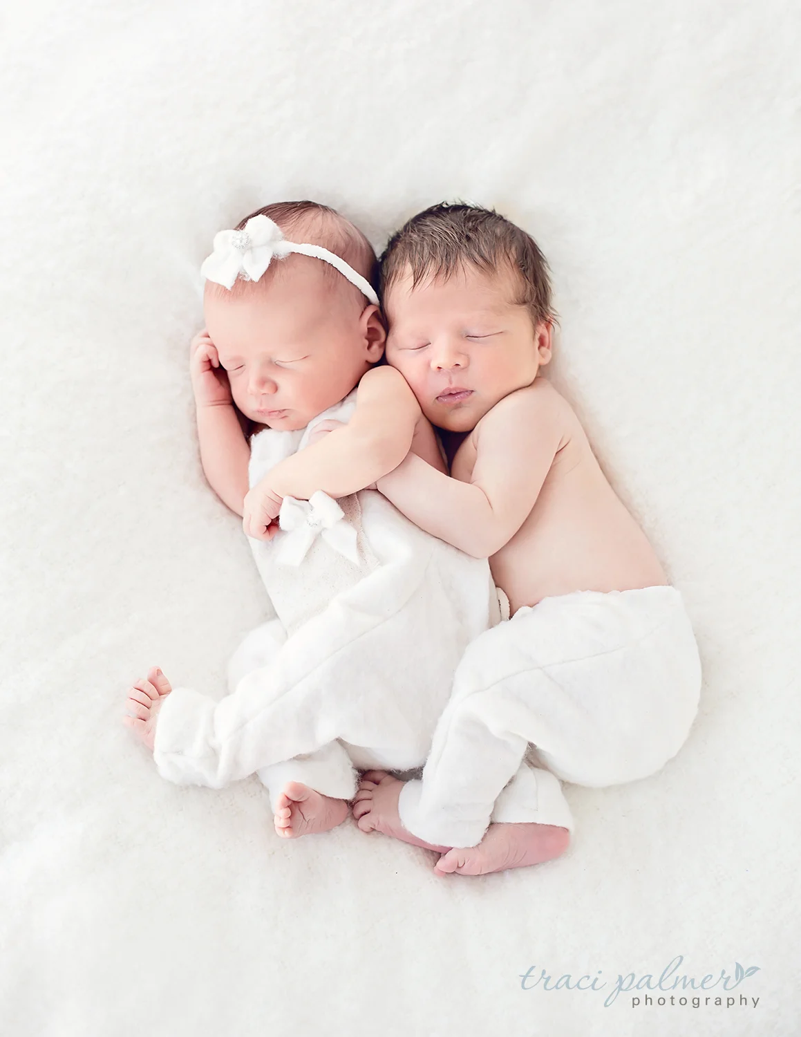 "Photographing a new born takes patience and a special skill. Traci always surpasses expectations." – Angie Erickson