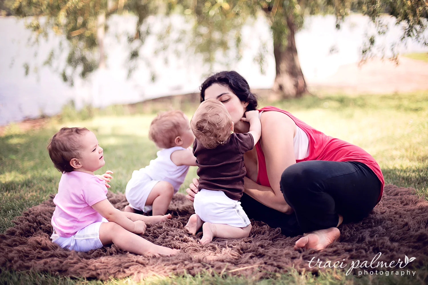 "I was so happy to do the shoot at Lake Nokomis, and I love the way Traci found just the right spot to make the lake background perfect for the images. Traci was also so kind and patient with our four kiddos! I treasure the pictures I have from that afternoon at one of our favorite places." – Jen March