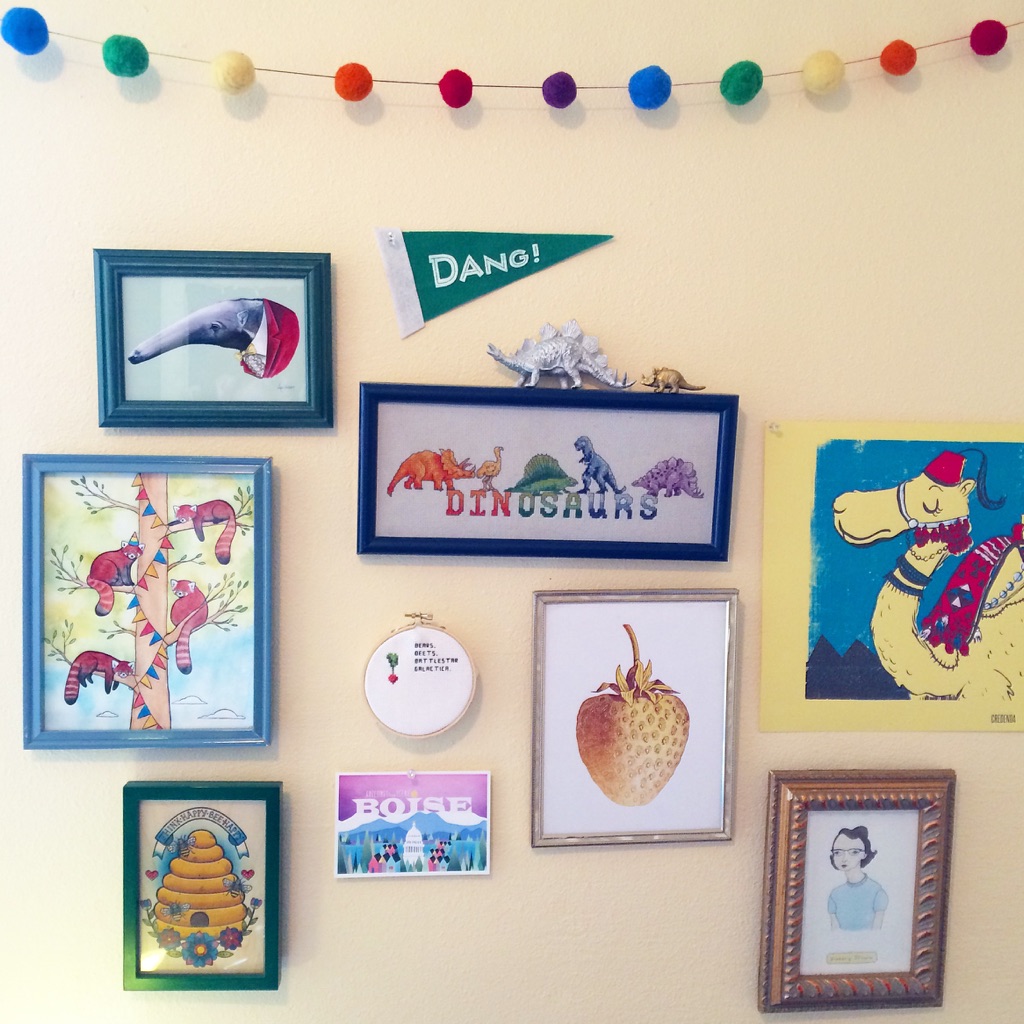 Anteater print from Berkley Illustration ; "Dang!" pendant from B.T. Livermore ; camel print from Julia Green ; strawberry print from Lotus Leaf Creations ; Flannery O'Connor portrait from Terrific Friends ; Boise postcard by Melanie Folwell ; beehive print from Jesiiii ; red panda print from Danielle Laurenti-Green ; "Bears, Beets, Battlestar Galactica" hoop from Snitches Get Stitched .