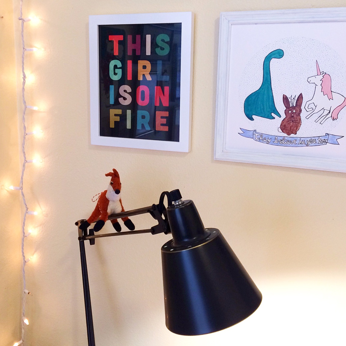 The "This Girl Is on Fire" print is from Live Love Studio , and the "They Believe In You Too" print is from my shop . Two awesome motivators!
