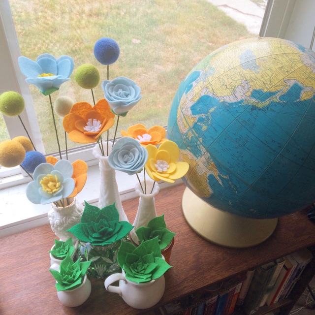 Flowers in progress! All our vases are thrifted, too, which adds even more fun to the project!