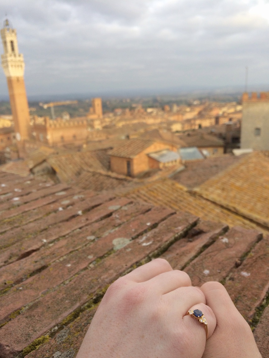 Nate proposed in Siena, Italy, on our first trip out of the country together. I'm totally smitten with the ring he picked out--especially now that it's been resized! :)