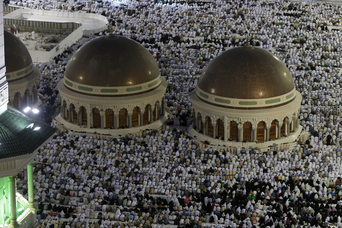 Muslim pilgrims pray during the annual Hajj pilgrimage in Mecca, September 27, 2014.