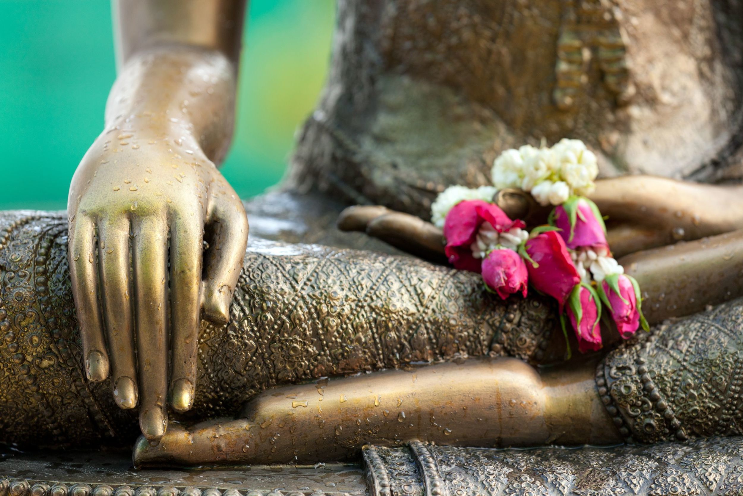 Buddha with flowers.jpg