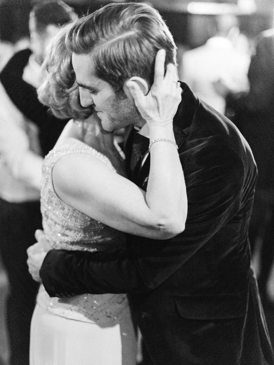 Emotional natural mother son dance photograph from intimate Italian wedding at The Burroughes. Captured by Toronto wedding photographer Corynn Fowler Photography.