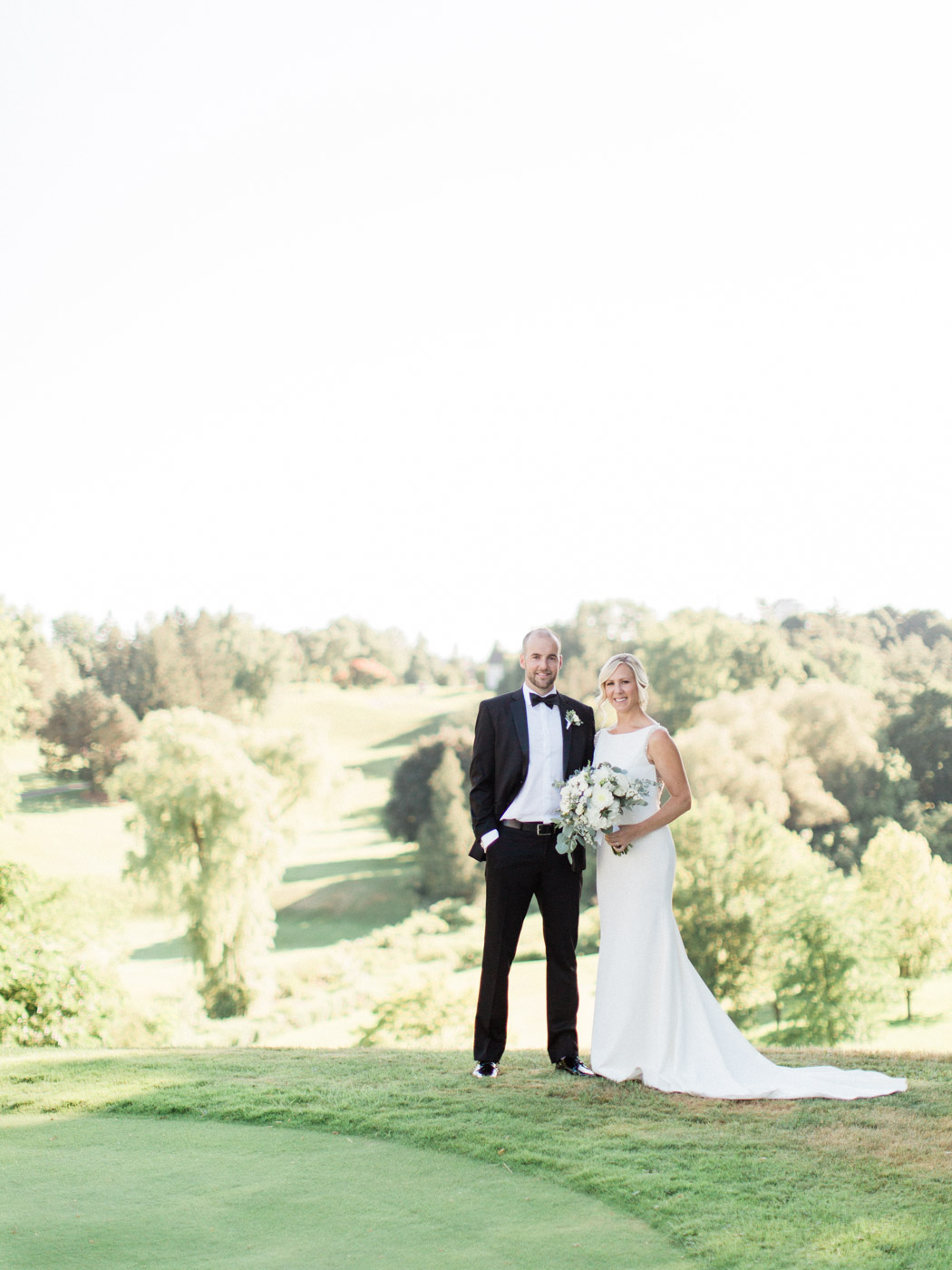 Photographs from an elegant yet relaxed summer wedding at The Thornhill Golf and Country Club, by Toronto Wedding Photographer Corynn Fowler Photography