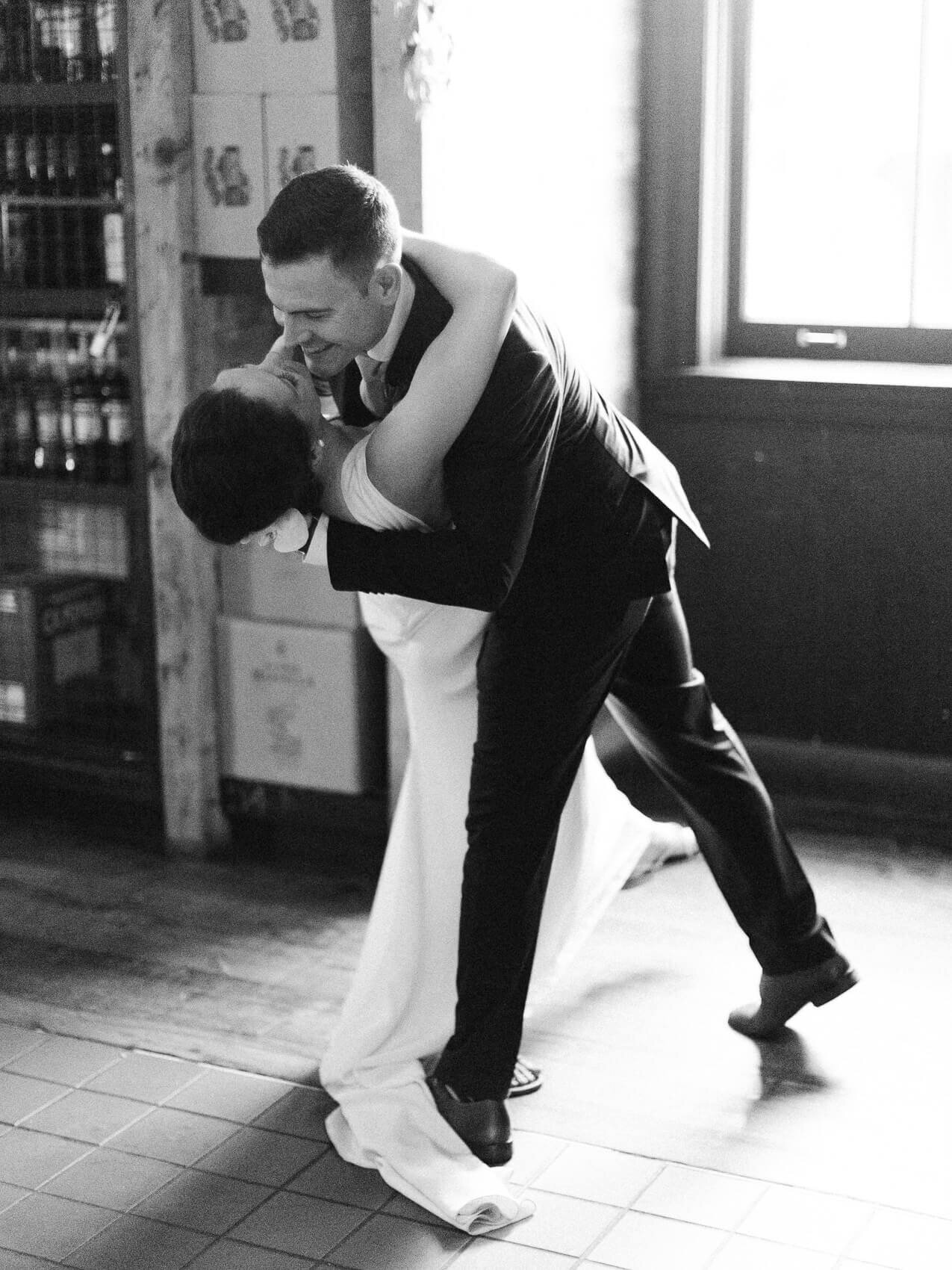 candid emotional first dance moment at an intimate downtown toronto wedding at terroni restaurant