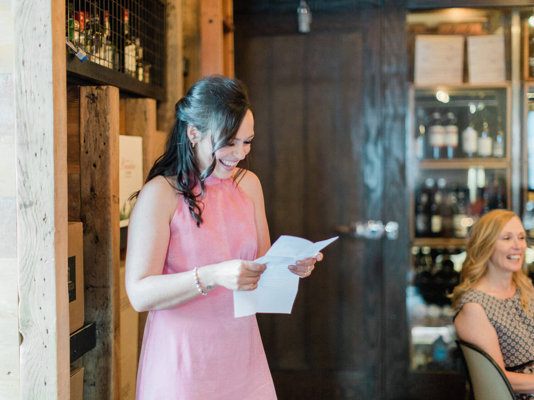candid wedding reception moment at an intimate downtown toronto wedding at terroni restaurant