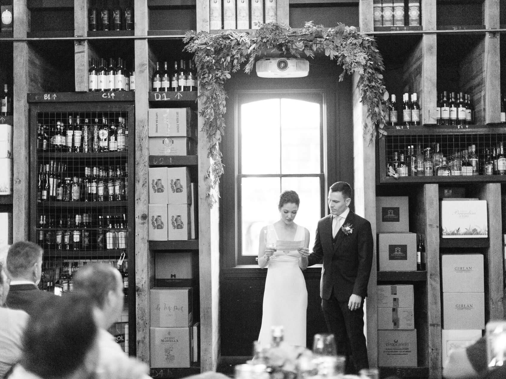 candid speech photograph at an intimate downtown toronto wedding at terroni restaurant