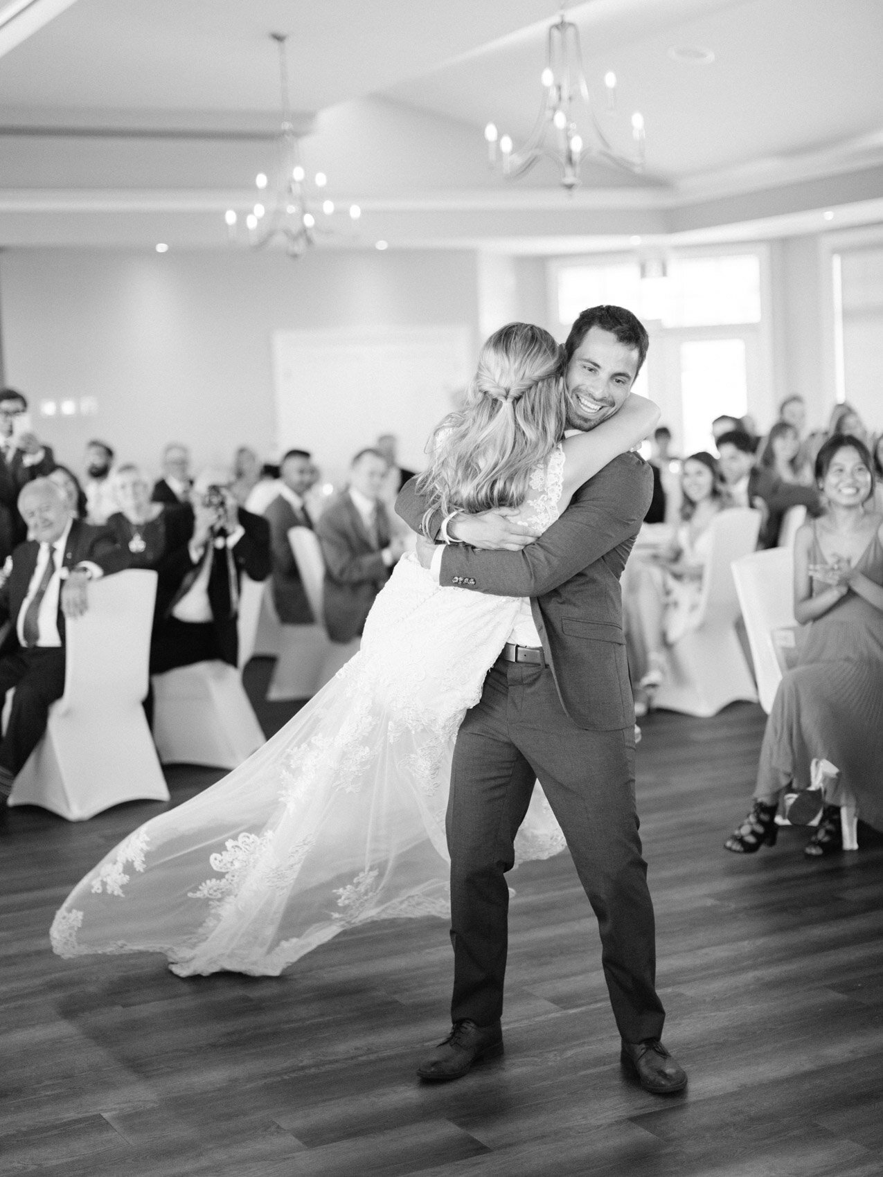 bride and groom enjoying a fun and lively first dance together at Cobble Beach