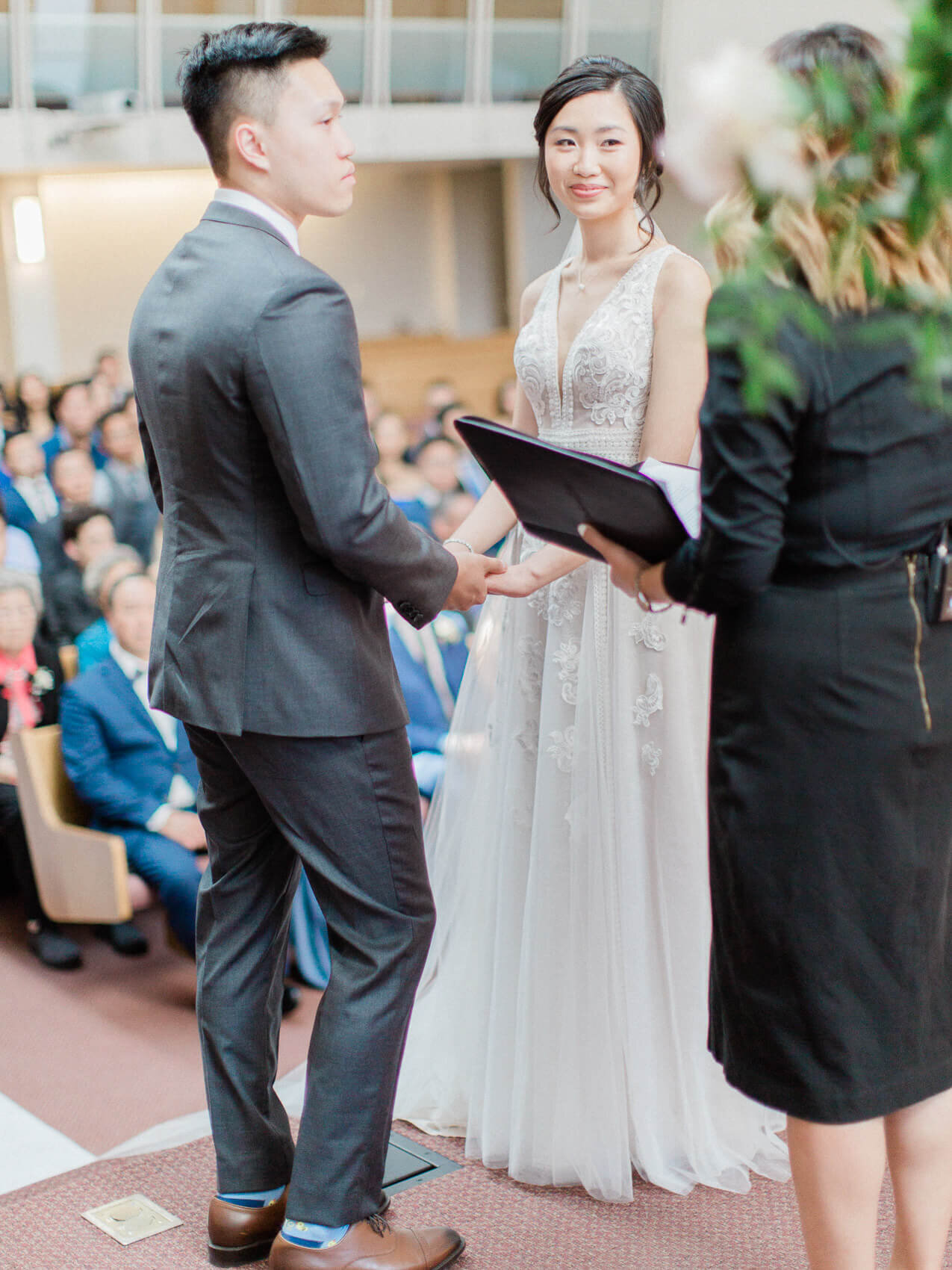 candid bride at groom during their wedding ceremony at the manor