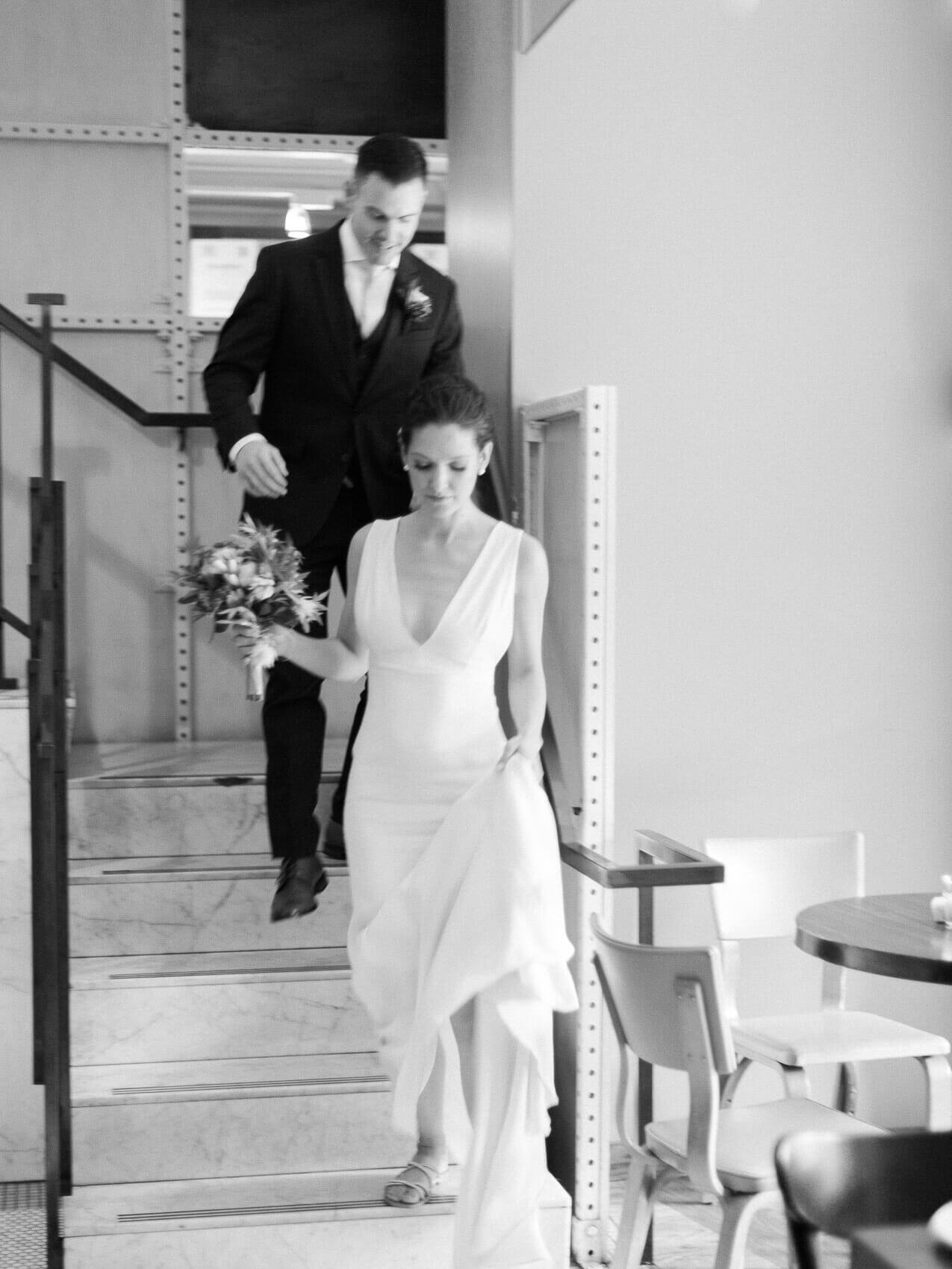 bride and groom posing naturally at their intimate terroni restaurant wedding