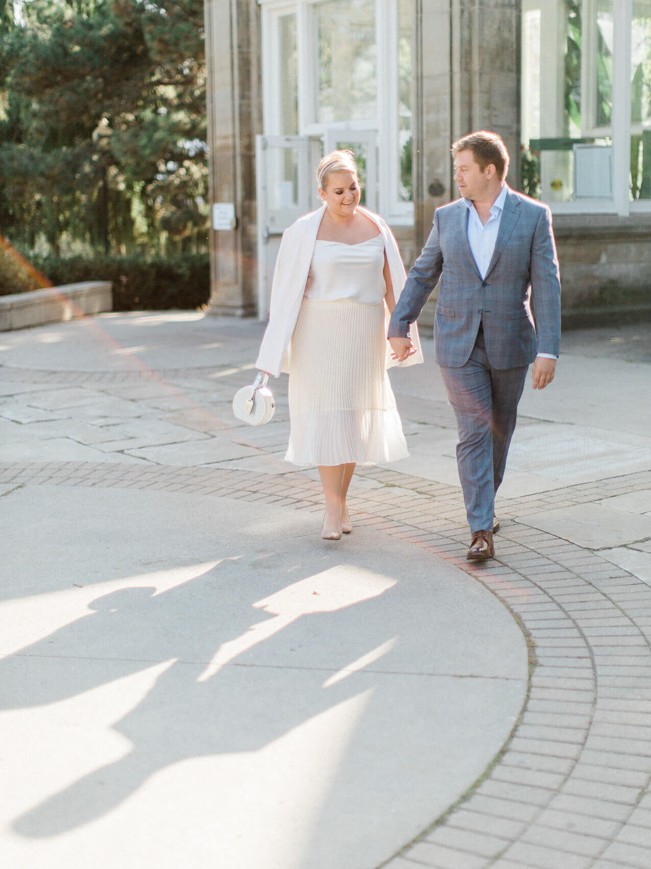 candid couple posing naturally for their wedding photos at their elopement at allen gardens