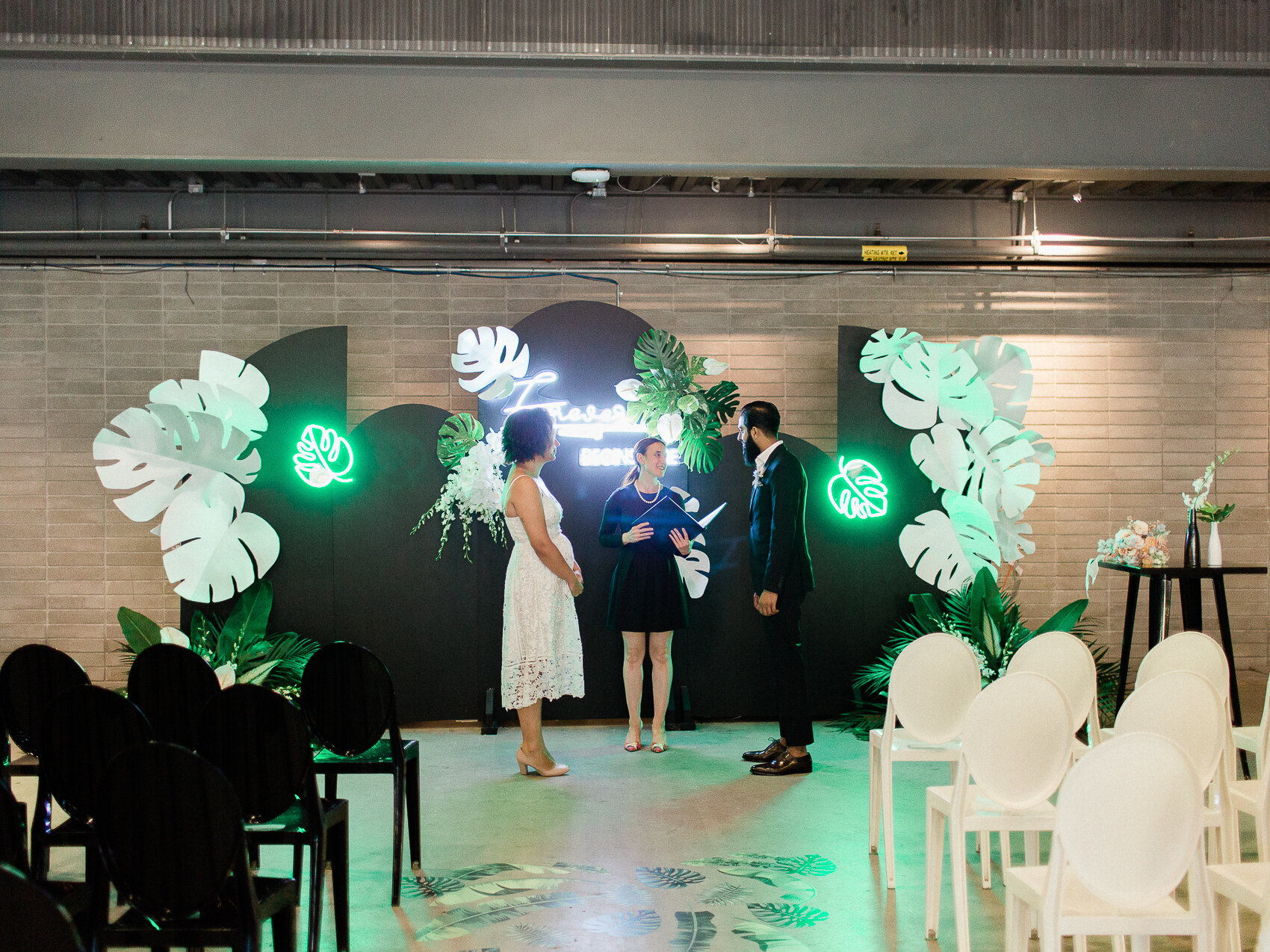 Wedding photographs from an elopement at the evergreen brickworks with the love by lynzie pop up chapel