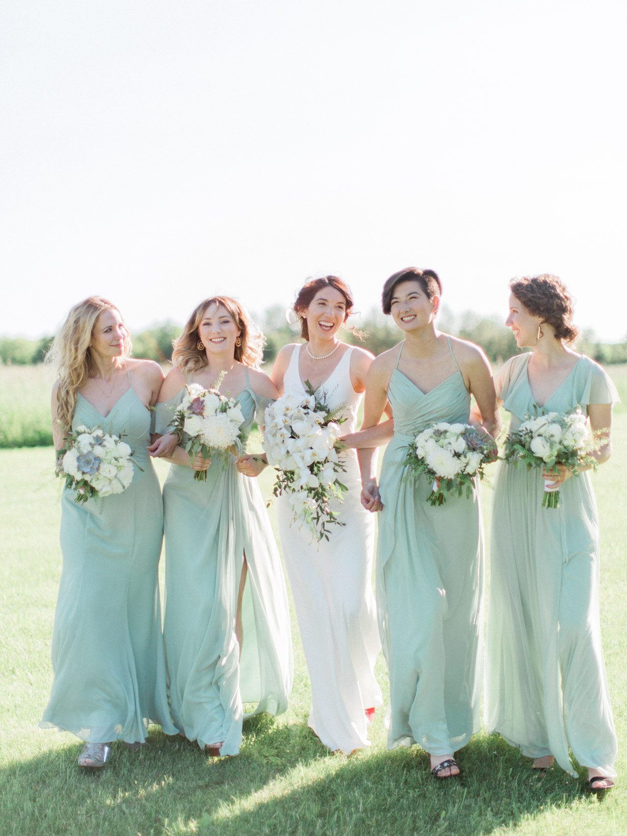 candid photo of outdoor summer wedding ceremony at silver springs retreat