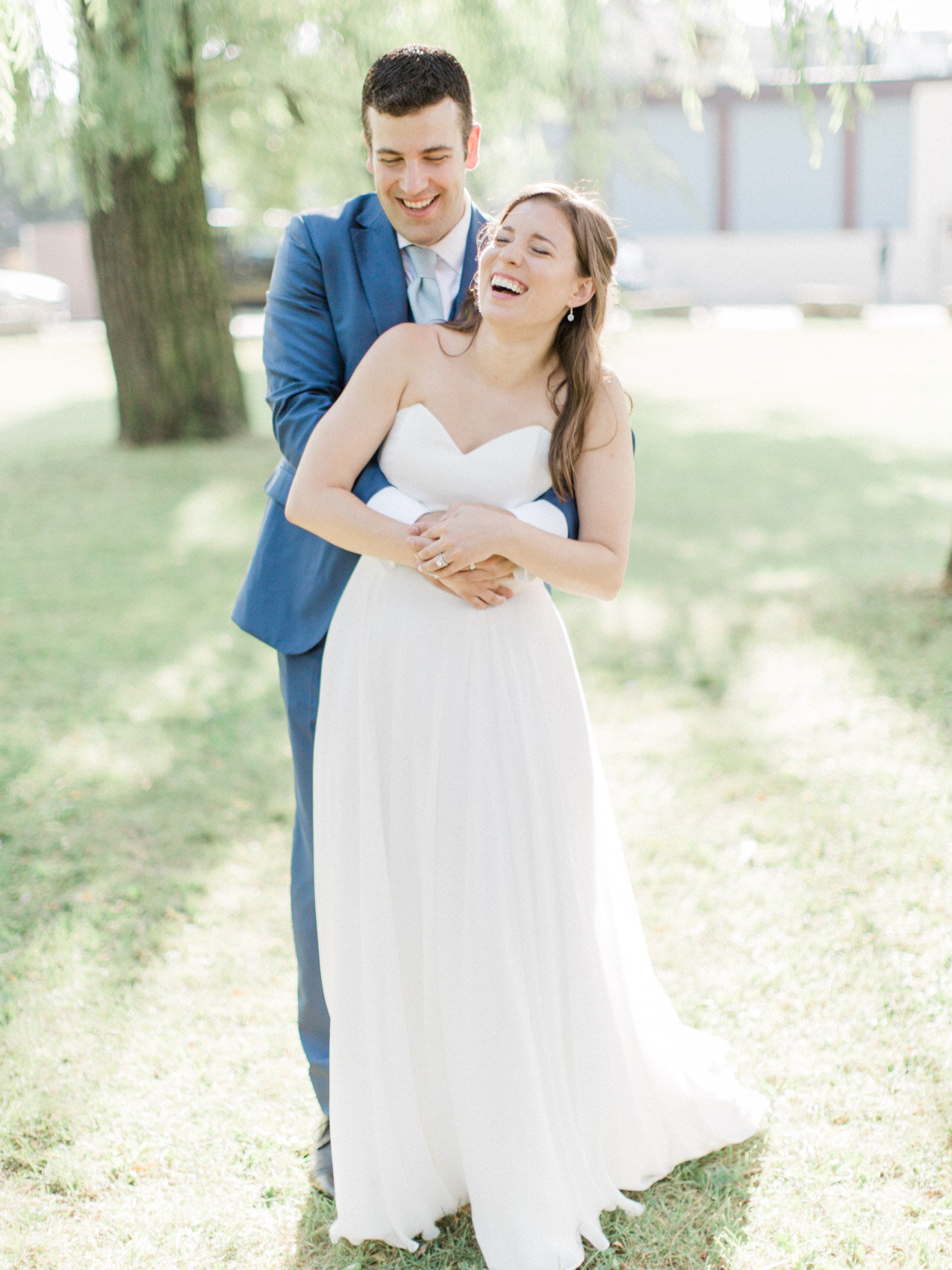 candid couple posing naturally for wedding photographs in downtown toronto