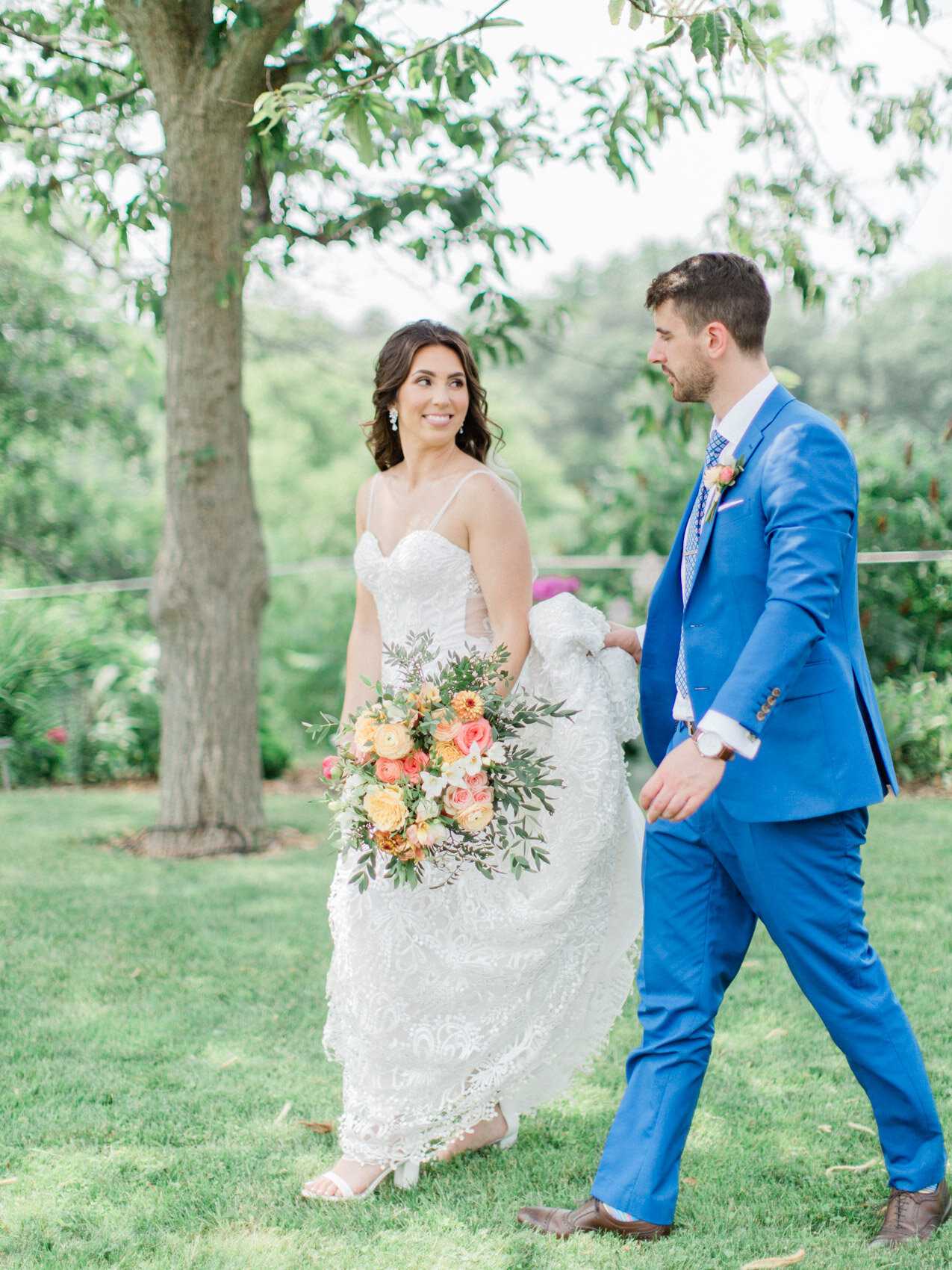 candid couple posing naturally at outdoor summer wedding with toronto wedding photographer corynn fowler photography