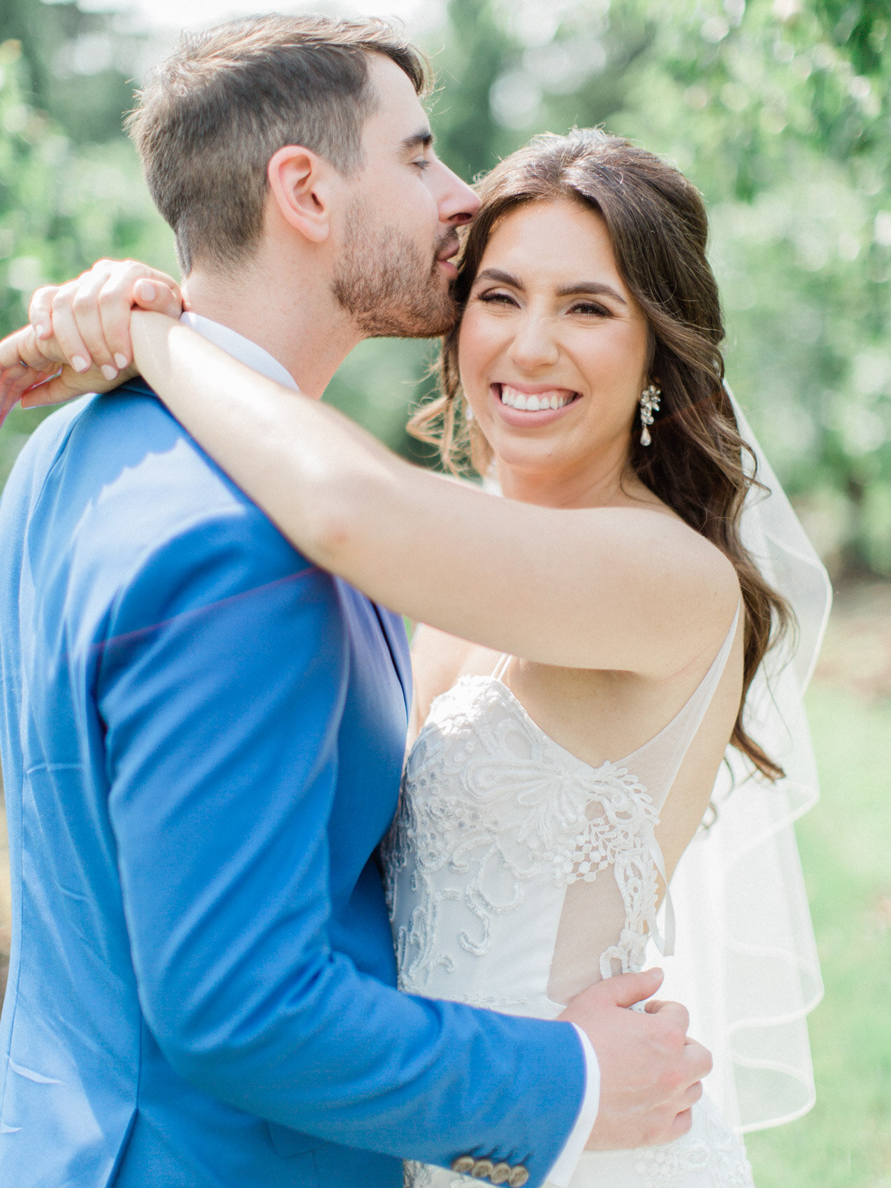 candid couple posing naturally at outdoor summer wedding with toronto wedding photographer corynn fowler photography