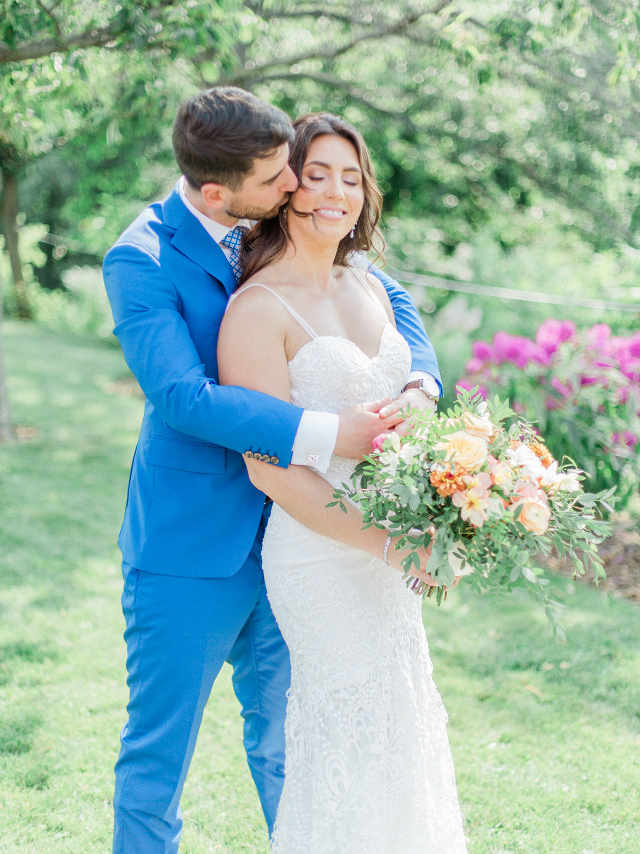 candid couple posing naturally at outdoor summer wedding with toronto wedding photographer corynn fowler photography