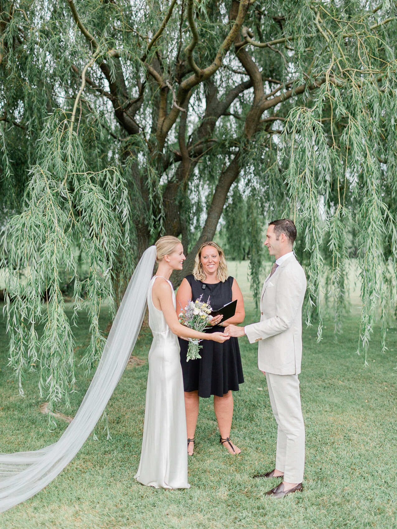 a couple get married at a backyard elopement