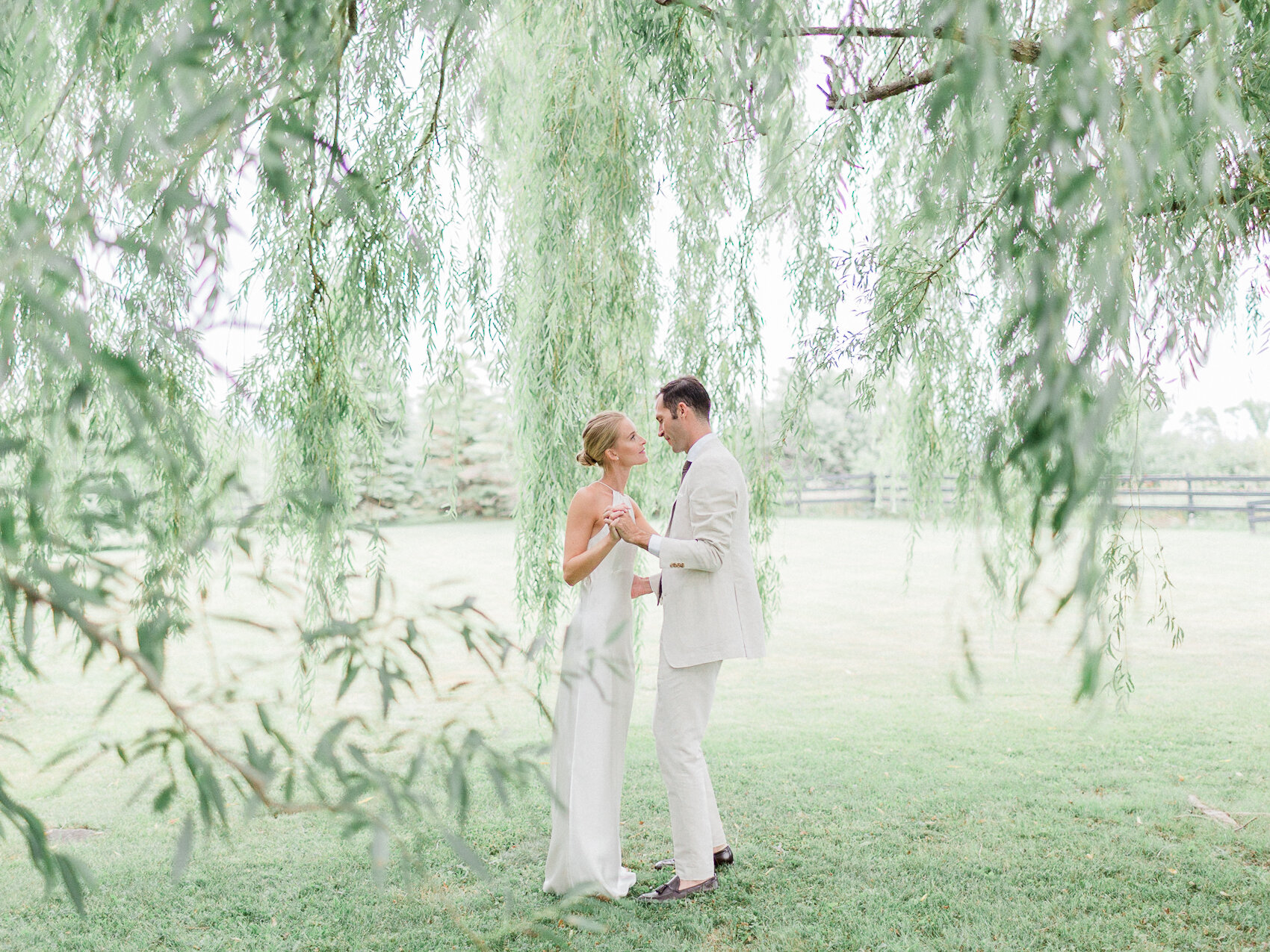 a couple have their first dance at their backyard georgian bay elopement