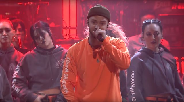 JT and his back-up dancers wearing merch from our Listening Session party on live television. 