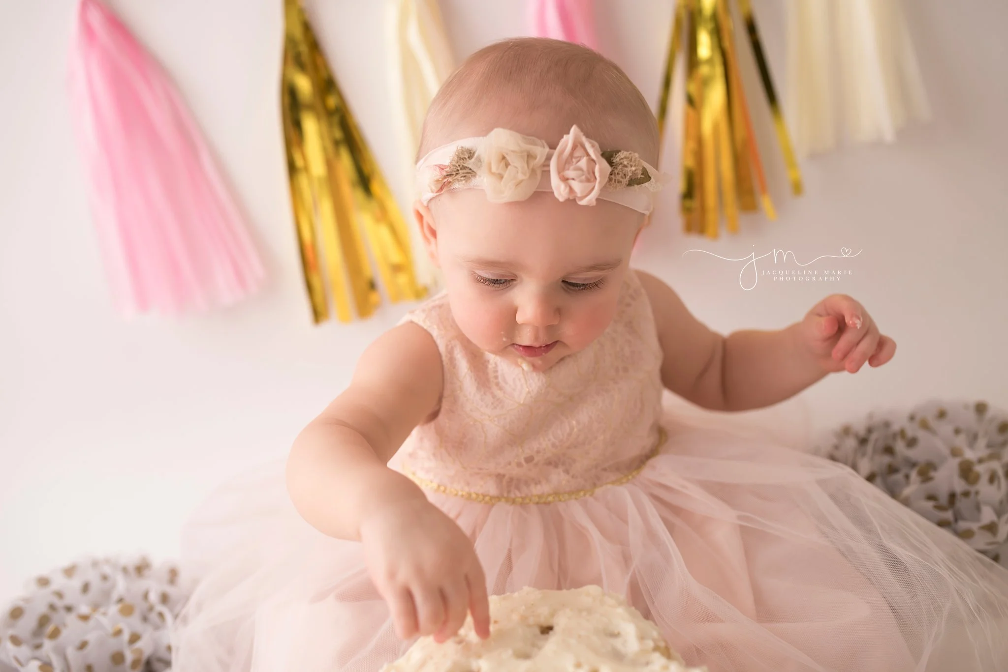 gold pink and cream custom cake smash first birthday photography provided by jacqueline marie photography