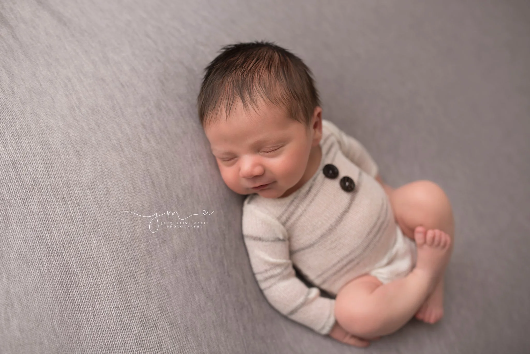 columbus ohio newborn smiles during portrait session by jacqueling marie photography 