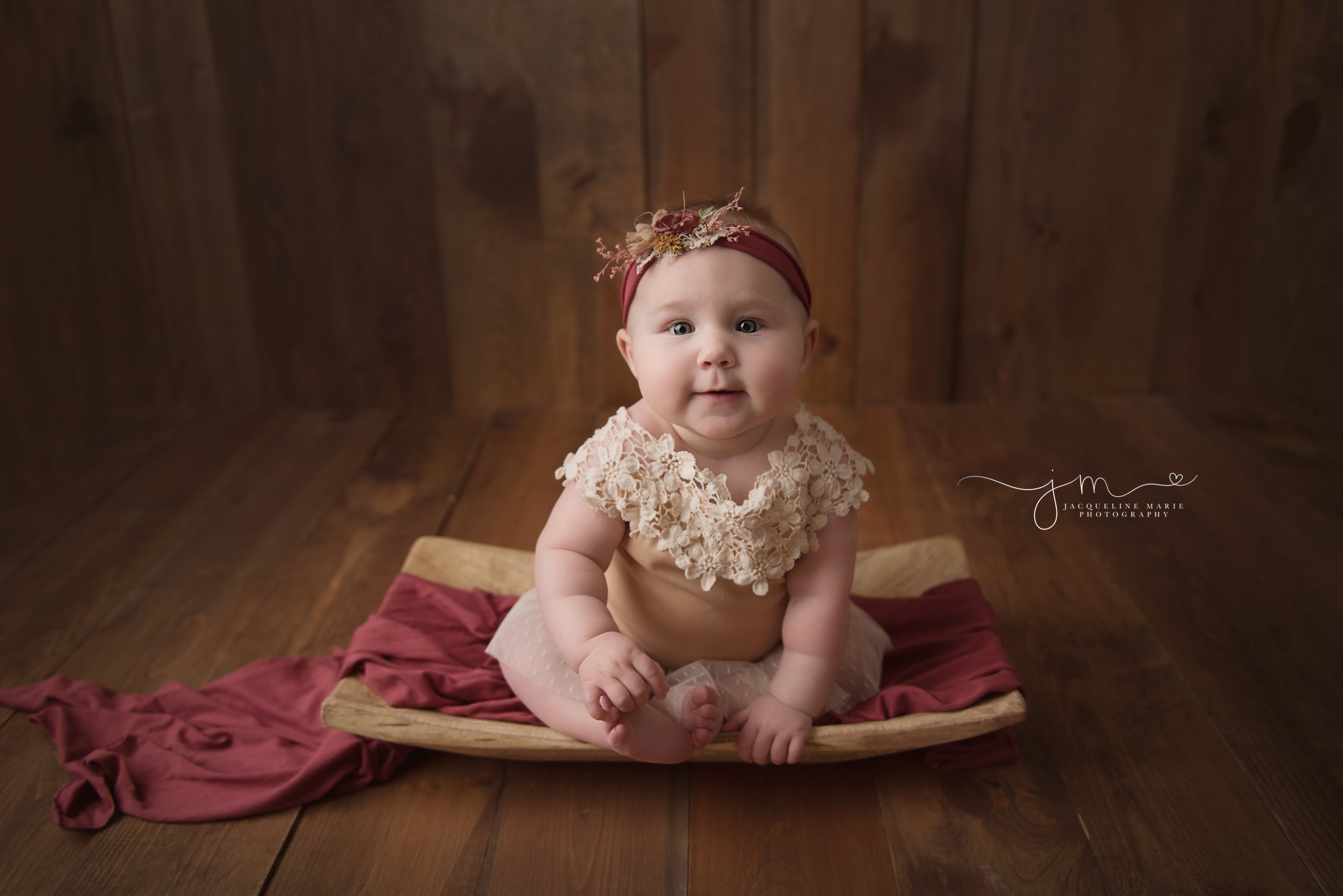 baby girl sophia wears tan and cream lace romper with matching headband for baby photography milestone pictures in columbus ohio