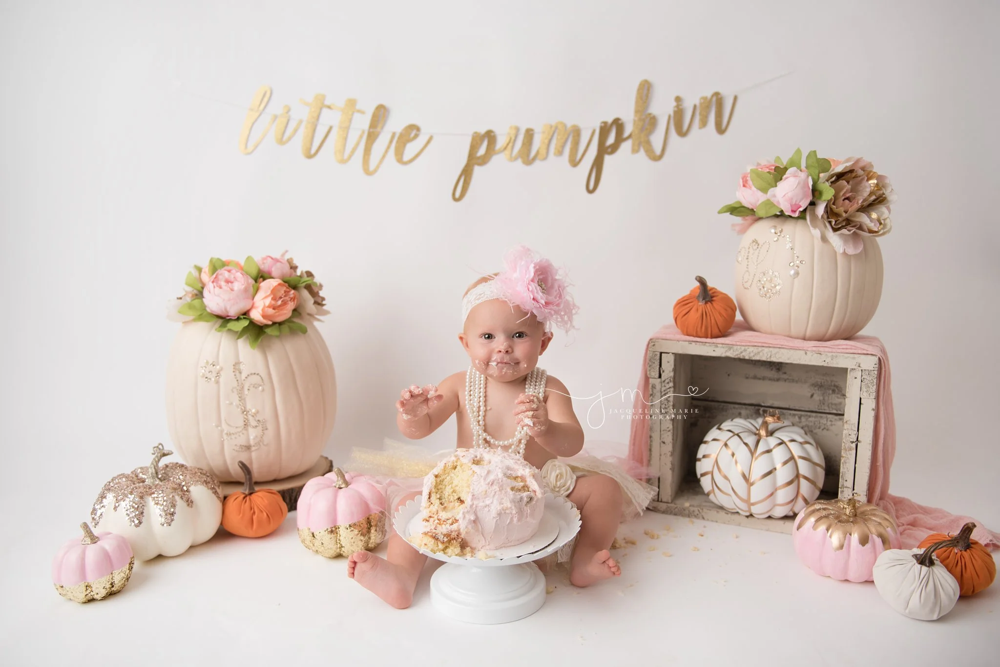 pink, gold and orange first birthday cake smash pictures in columbus ohio