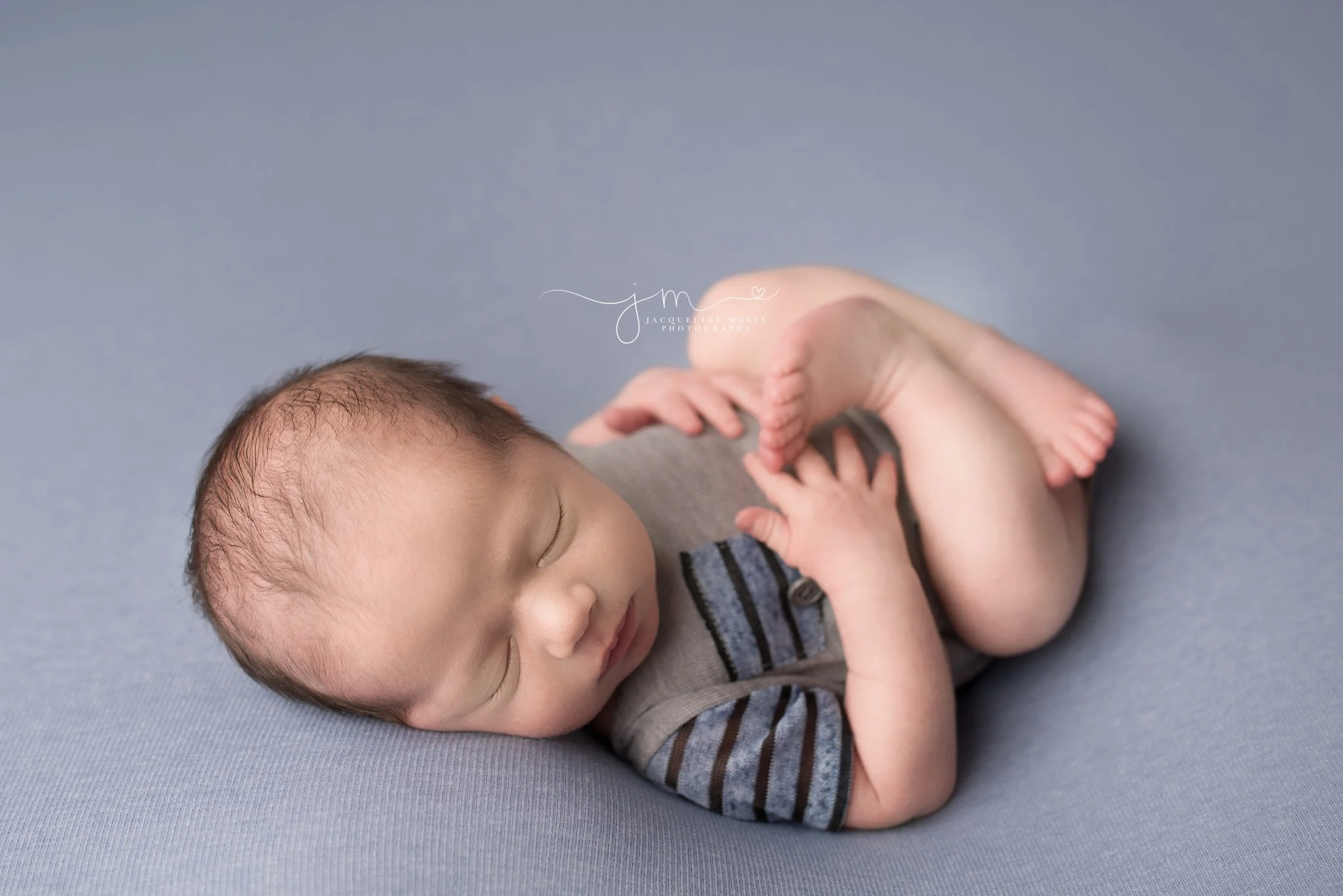 newborn baby boy photography session with gray and blue in Columbus ohio