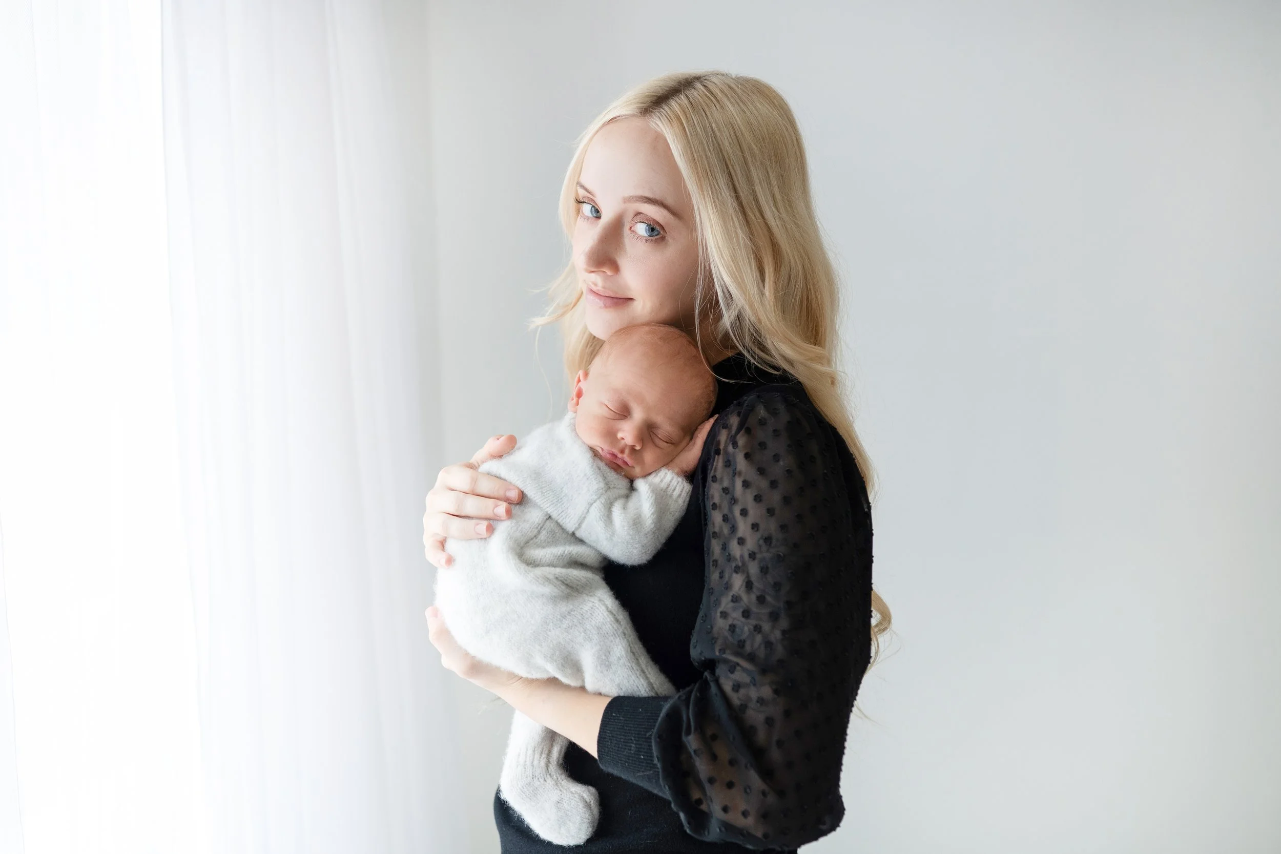 editorial style newborn baby and mom image