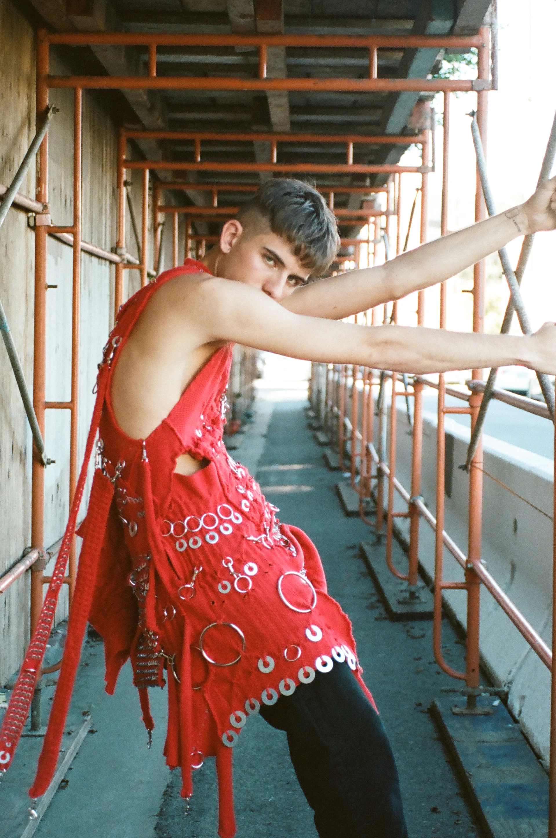 Shrink Treated Marino Lambswool in shade "Real Red," machine knitted with applied hardware. click here for the full concept collection Model: Indiana Piorek // Photos: Kristen Jan Wong