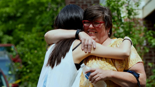 Guests hugging