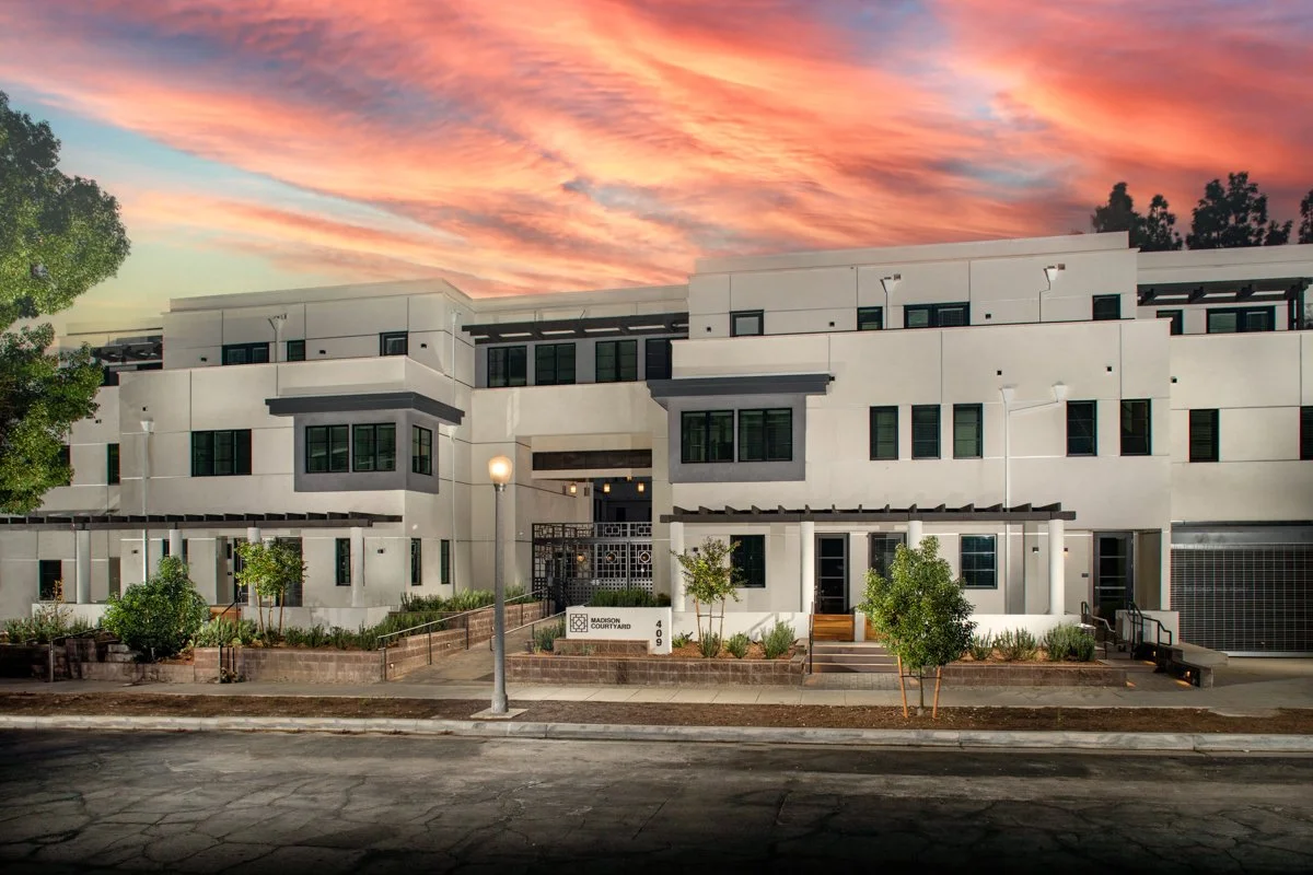 TMC_Madison_Courtyard_Frt_Ext_Twi_Sky.jpg