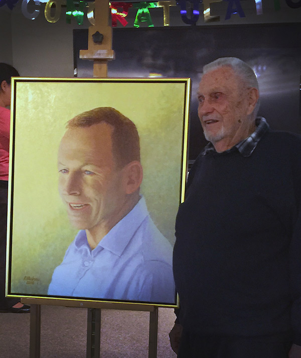 Phil Mulray with his Archibald painting of MP Tony Abbott.